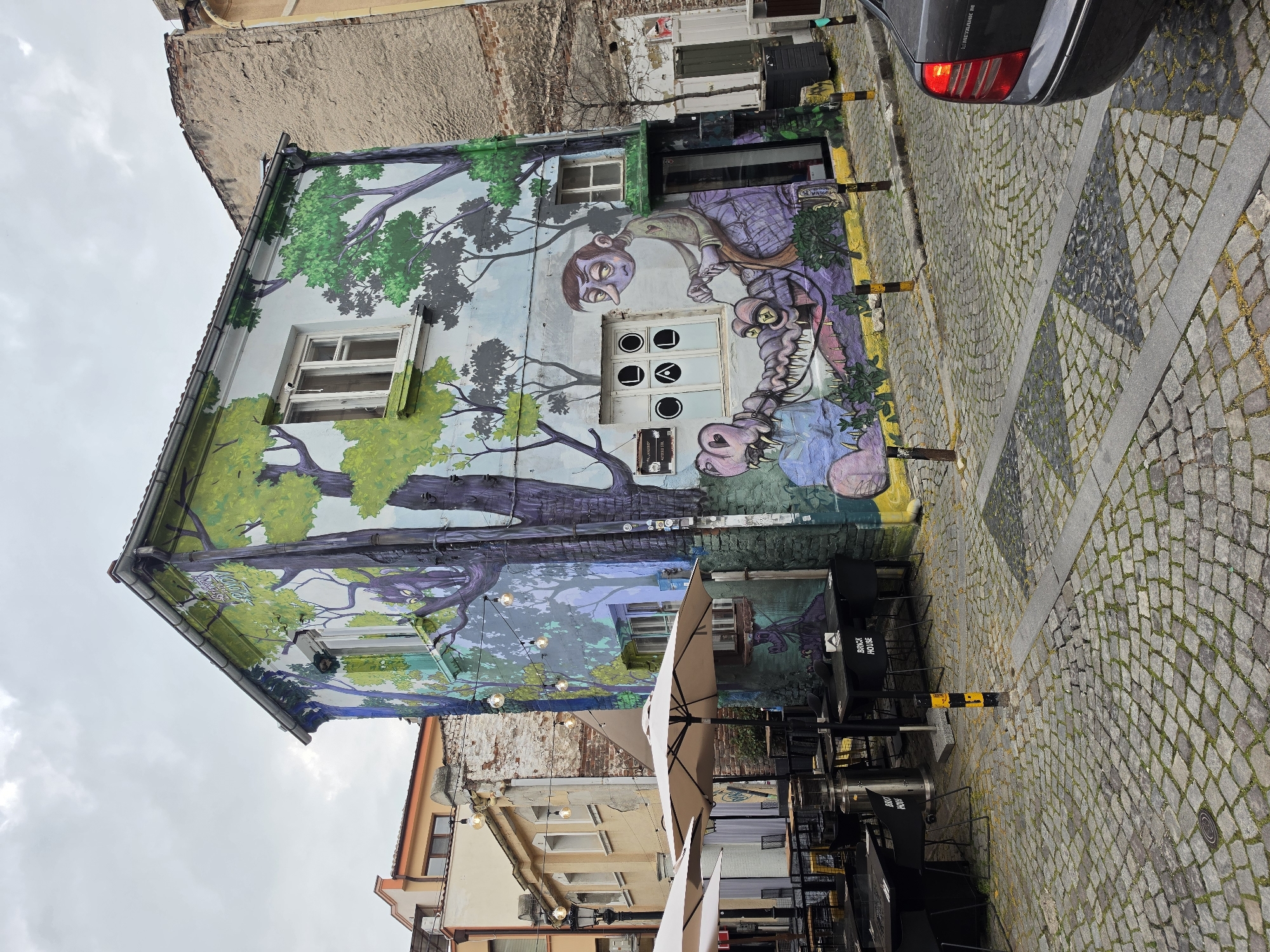 Tourist explores historic Plovdiv landmarks and dining areas
