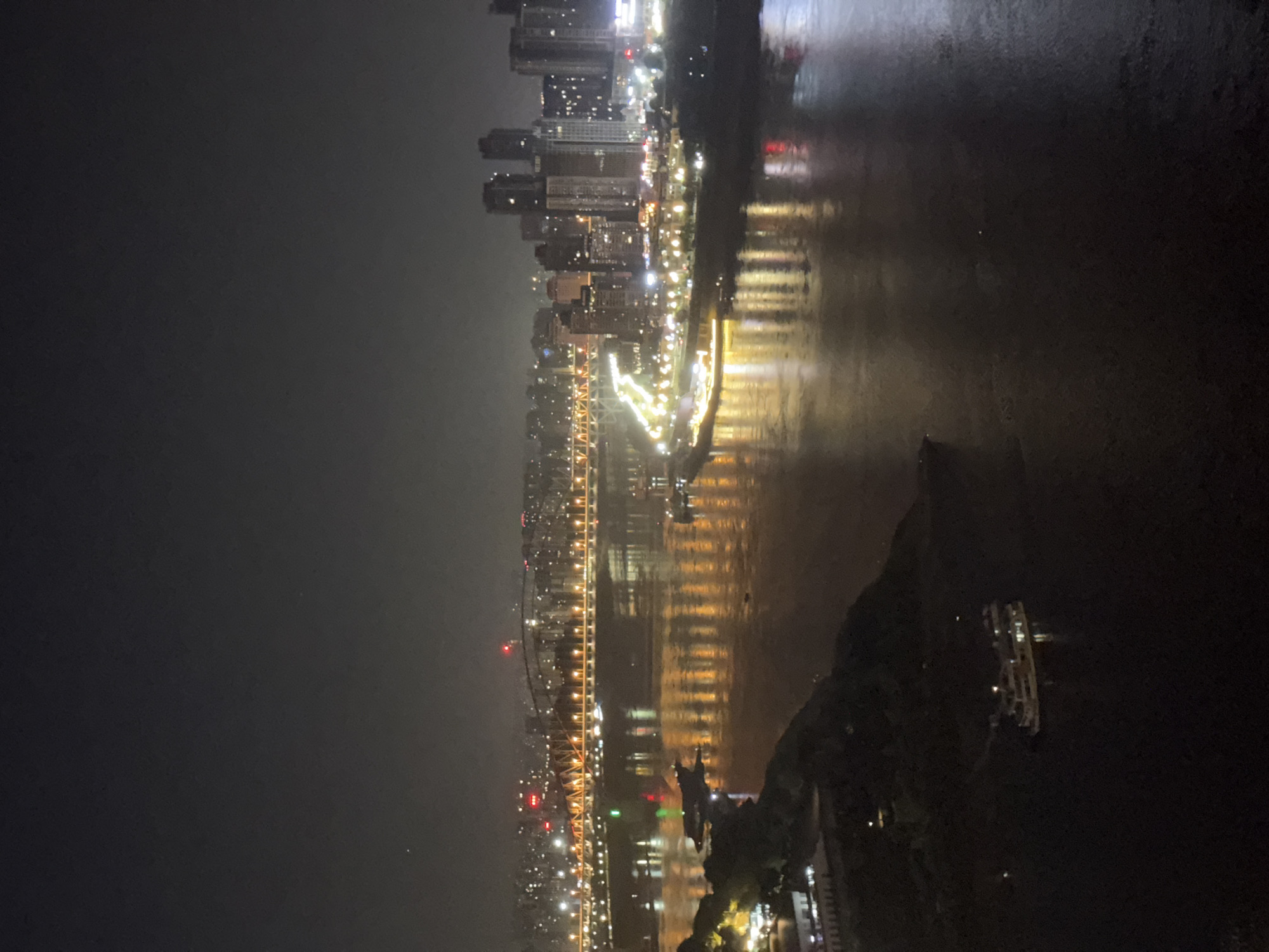 Yuzhong District at night, skyline and streets below