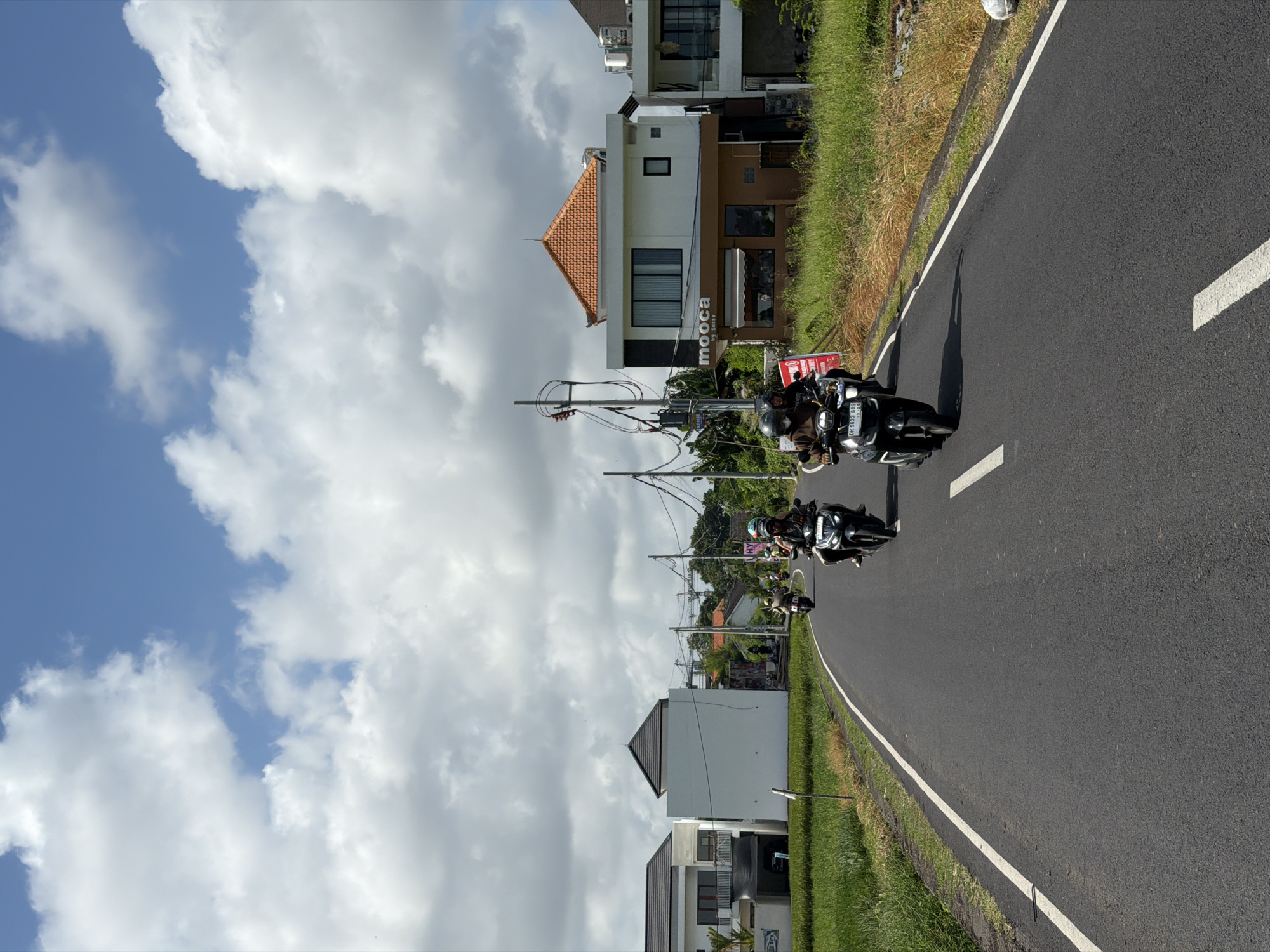 Morning motorcycle traffic observed on North Kuta street
