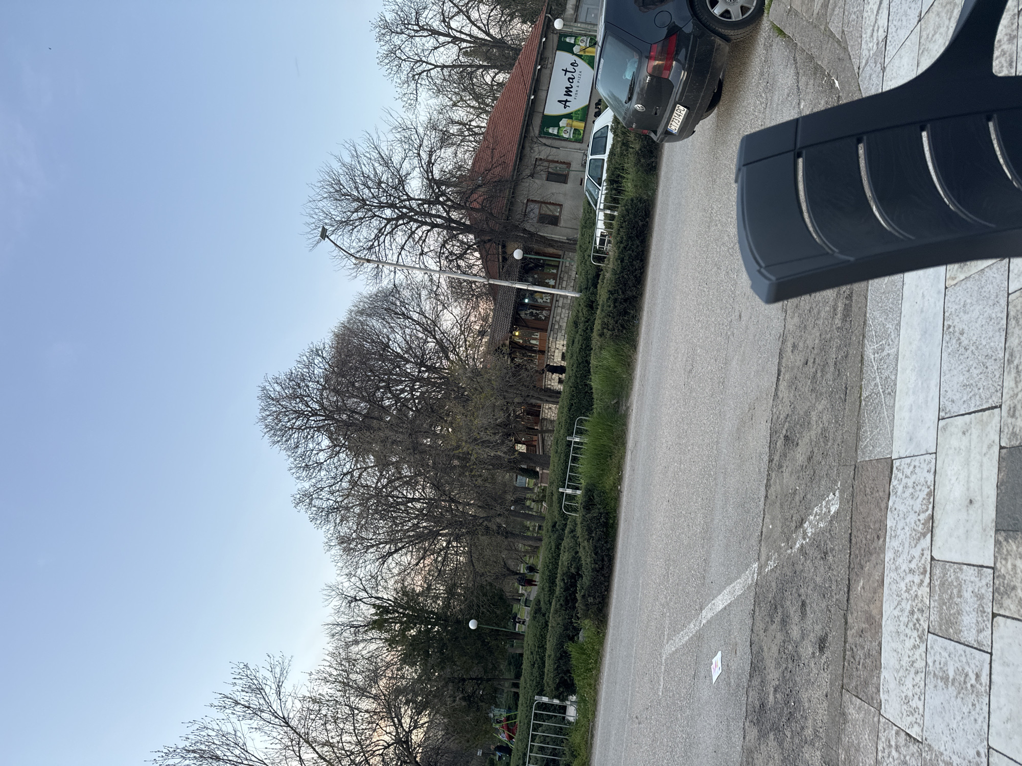 Street scene captured in Chirpan, Bulgaria featuring local restaurant