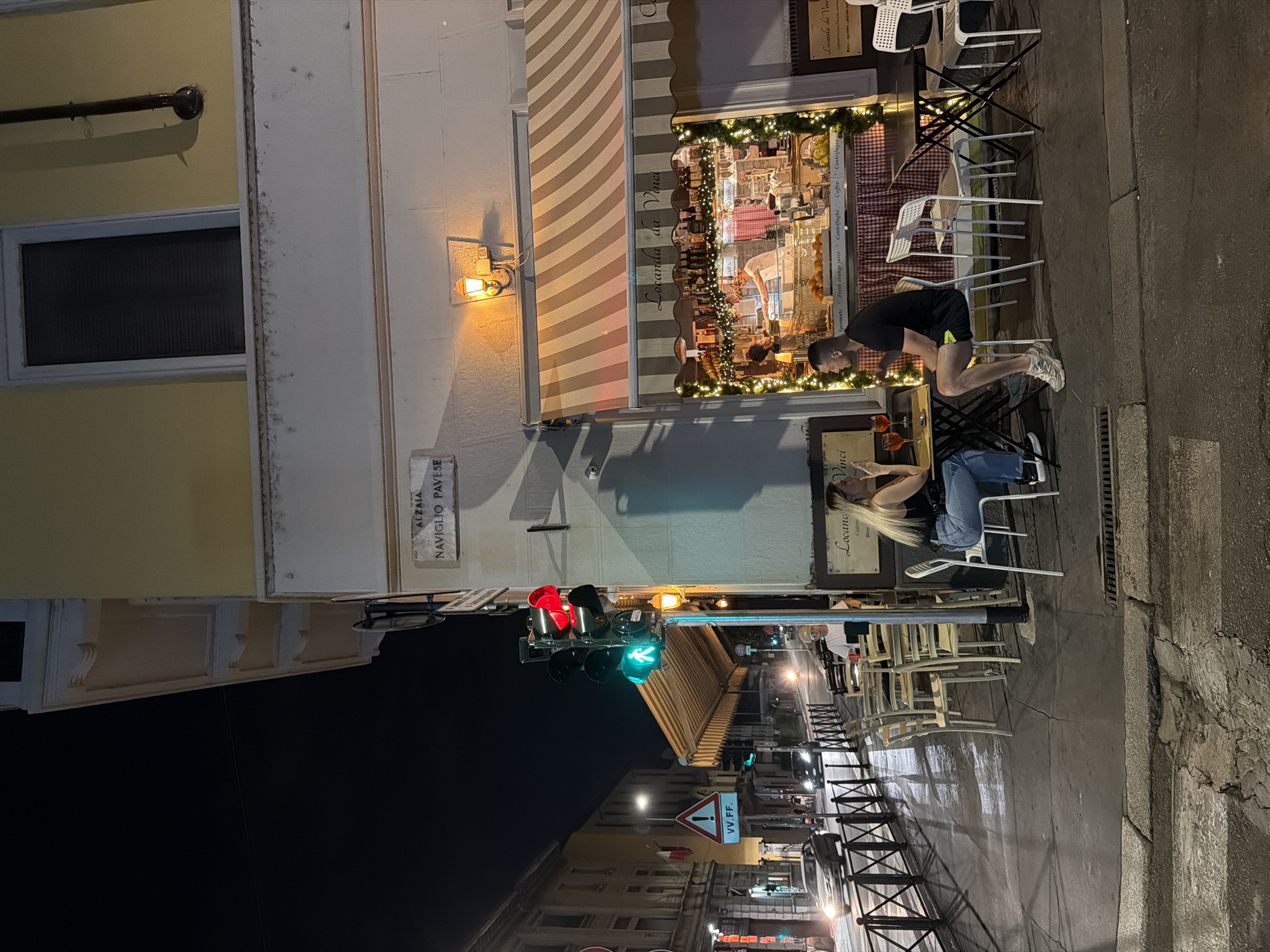 Milan's Navigli at night: canals, a trattoria, and street lights