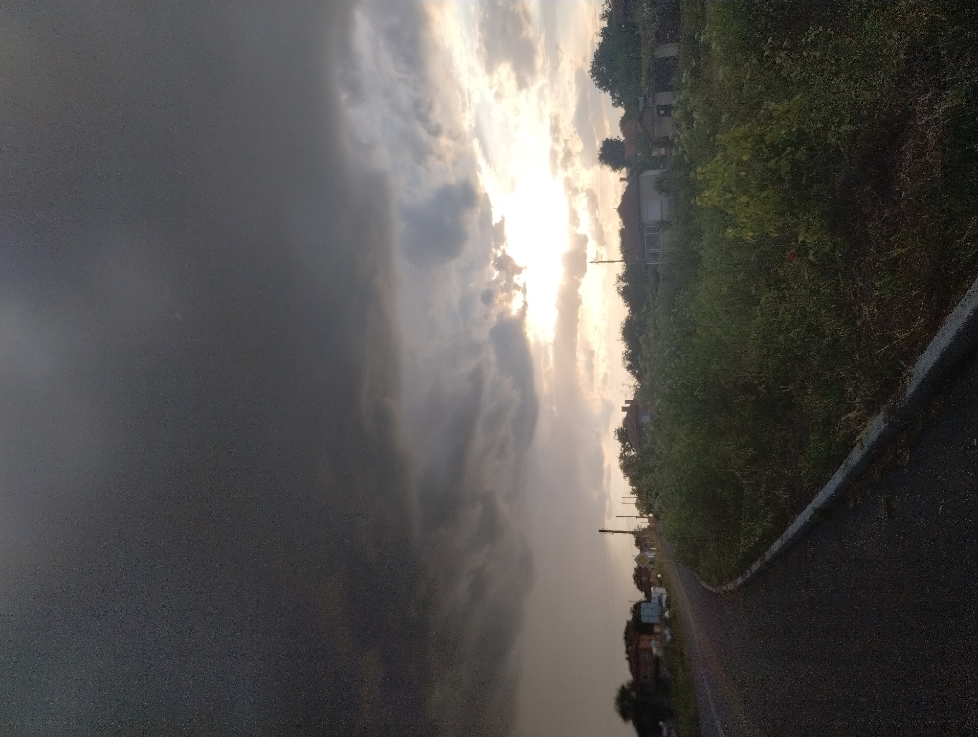 Rainbow appears over rural Bulgarian village after storm clouds