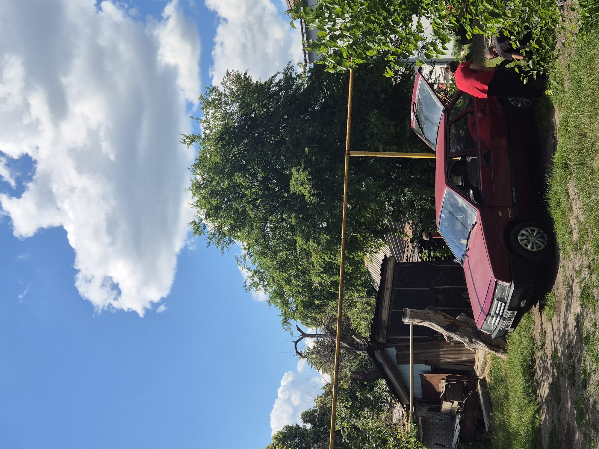 Summer morning in a small Ukrainian village: gardens, bikes, and blooms