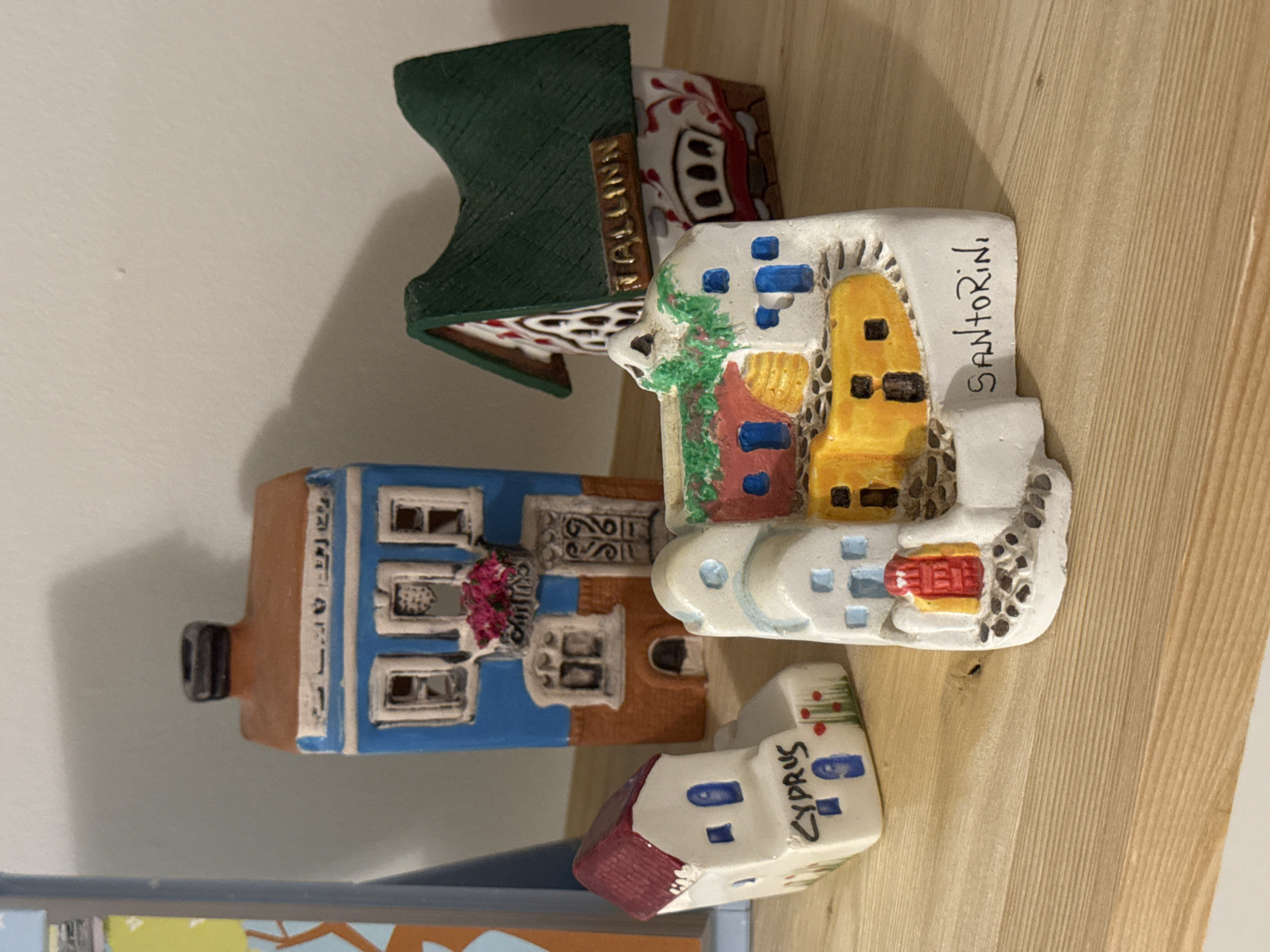 Tourist souvenirs and calendar displayed indoors in Izhevsk