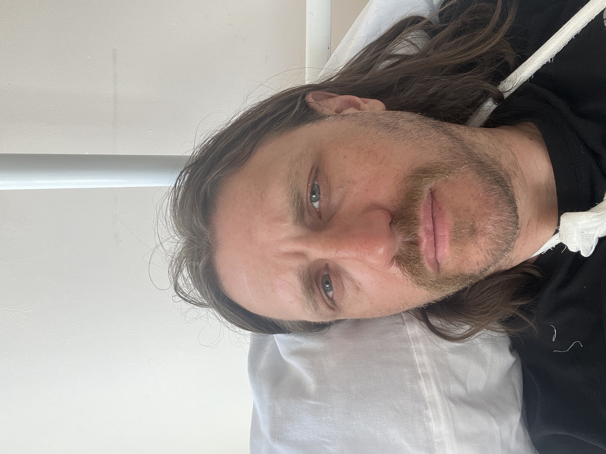 Man rests in medical facility during early morning hours