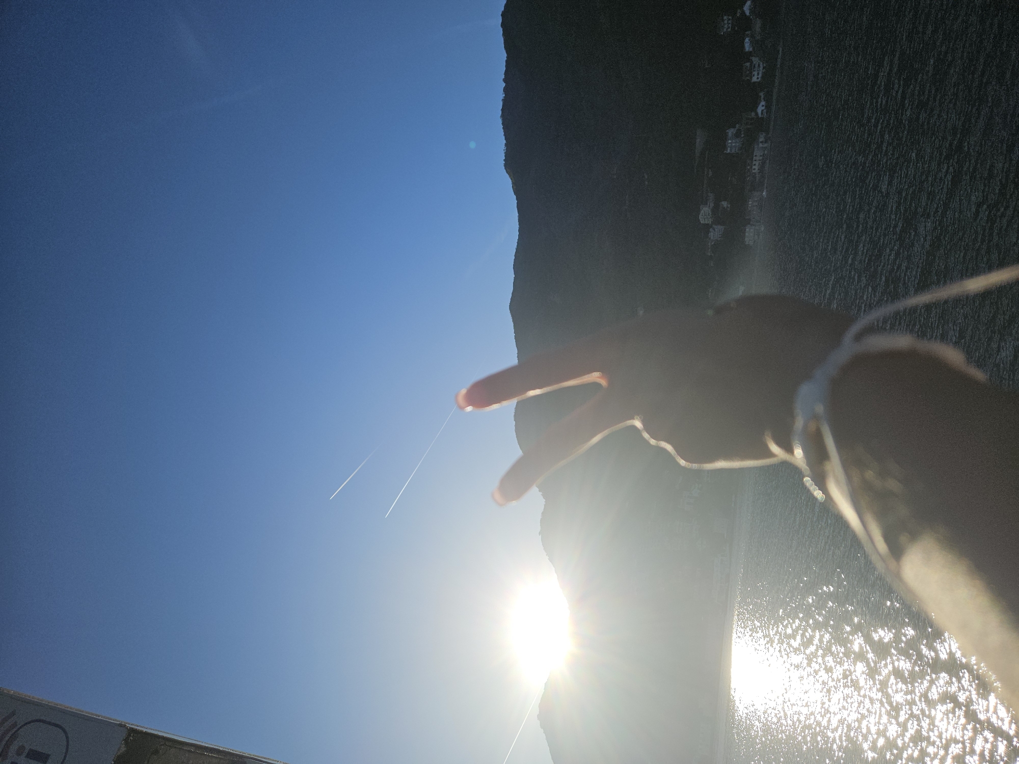 Aircraft contrail spotted in clear skies over Lepetane, Montenegro