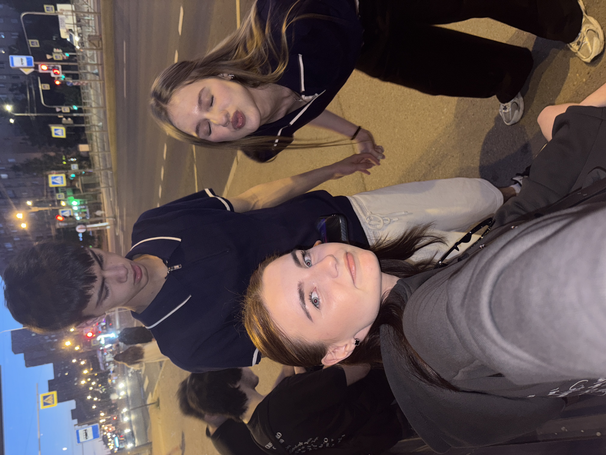 Young people socialize, take selfies during evening in Ladozhskoe Ozero