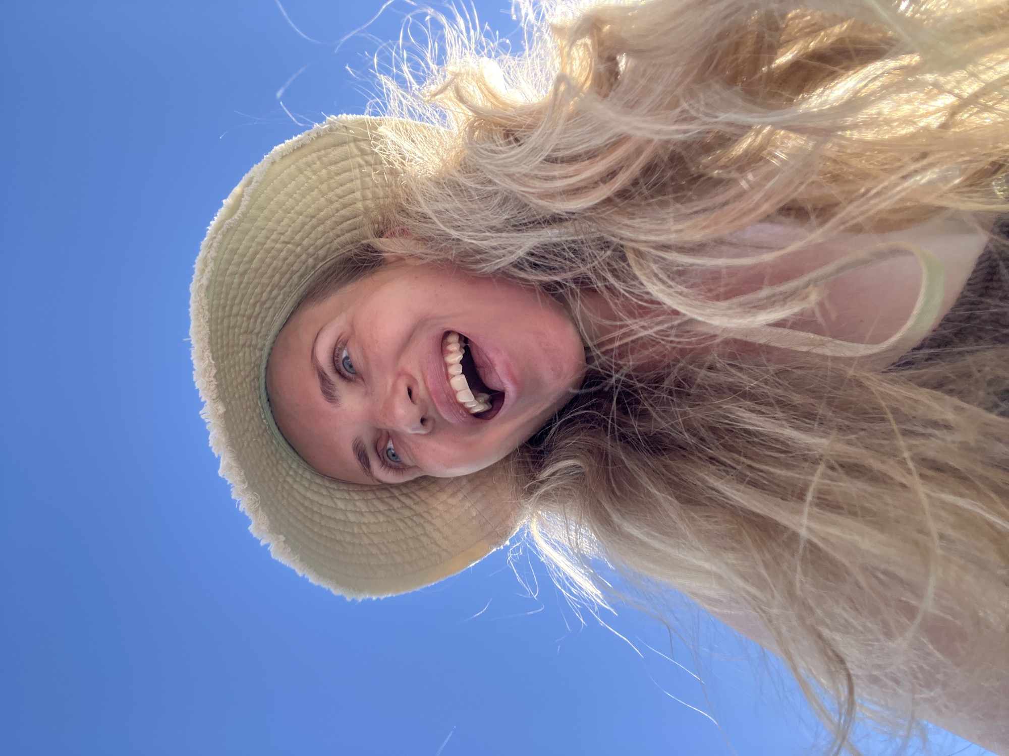 Sunny selfie session in Saint Petersburg, straw hat and blue skies