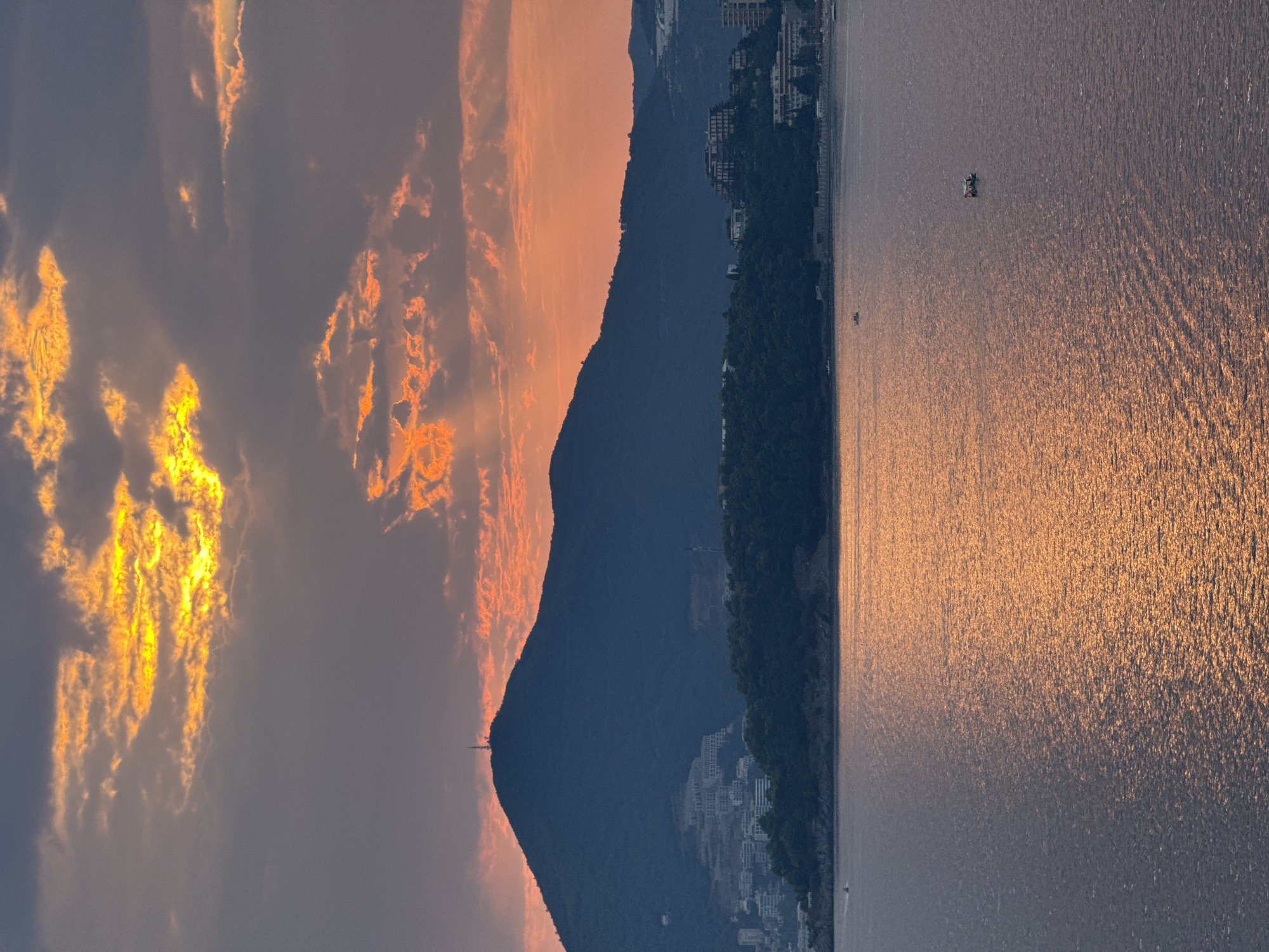 Golden hour over a calm Montenegrin bay