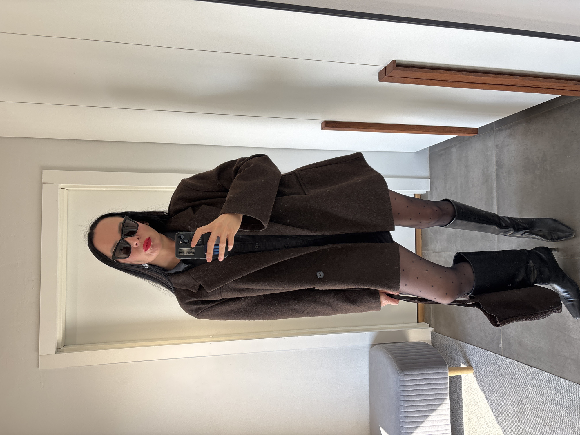 Woman takes mirror selfies in Chaikovsky, Russia