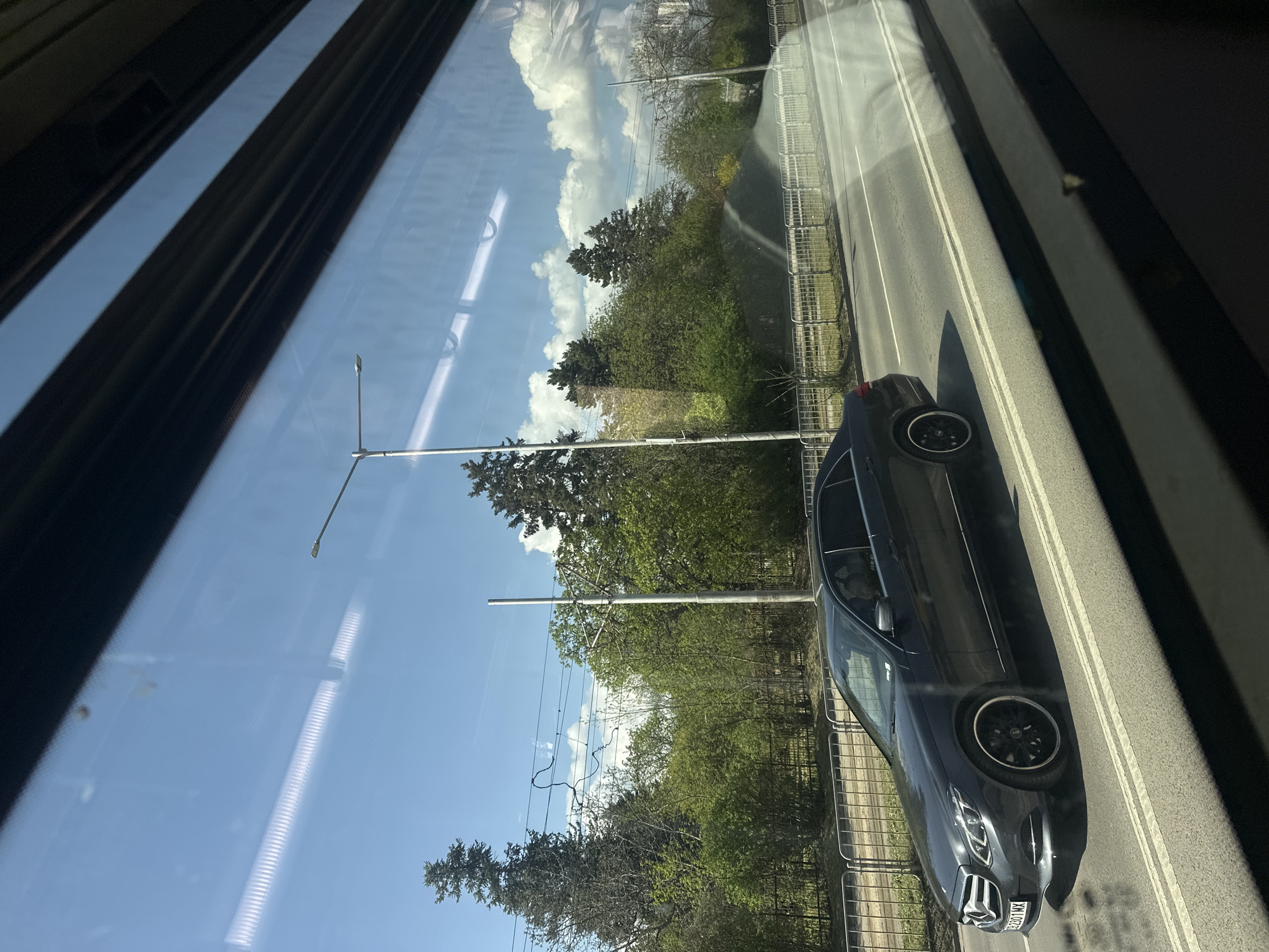 Transit passenger captures Sofia street scene through vehicle window