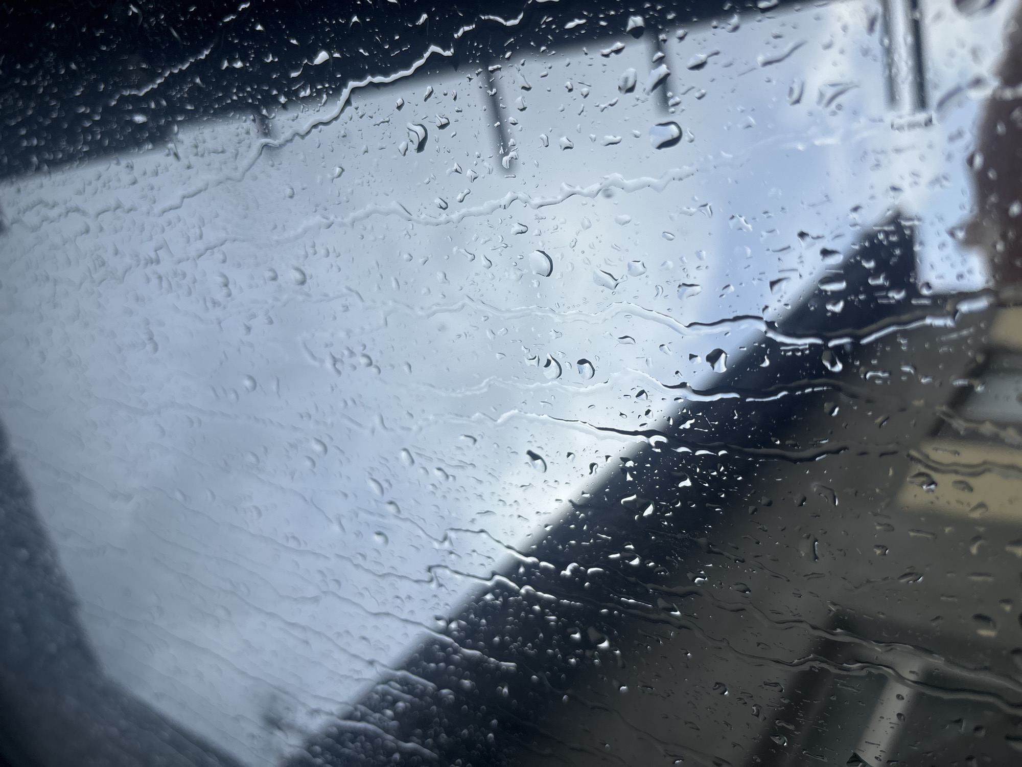 Morning rain observed through windows in Lom, Bulgaria