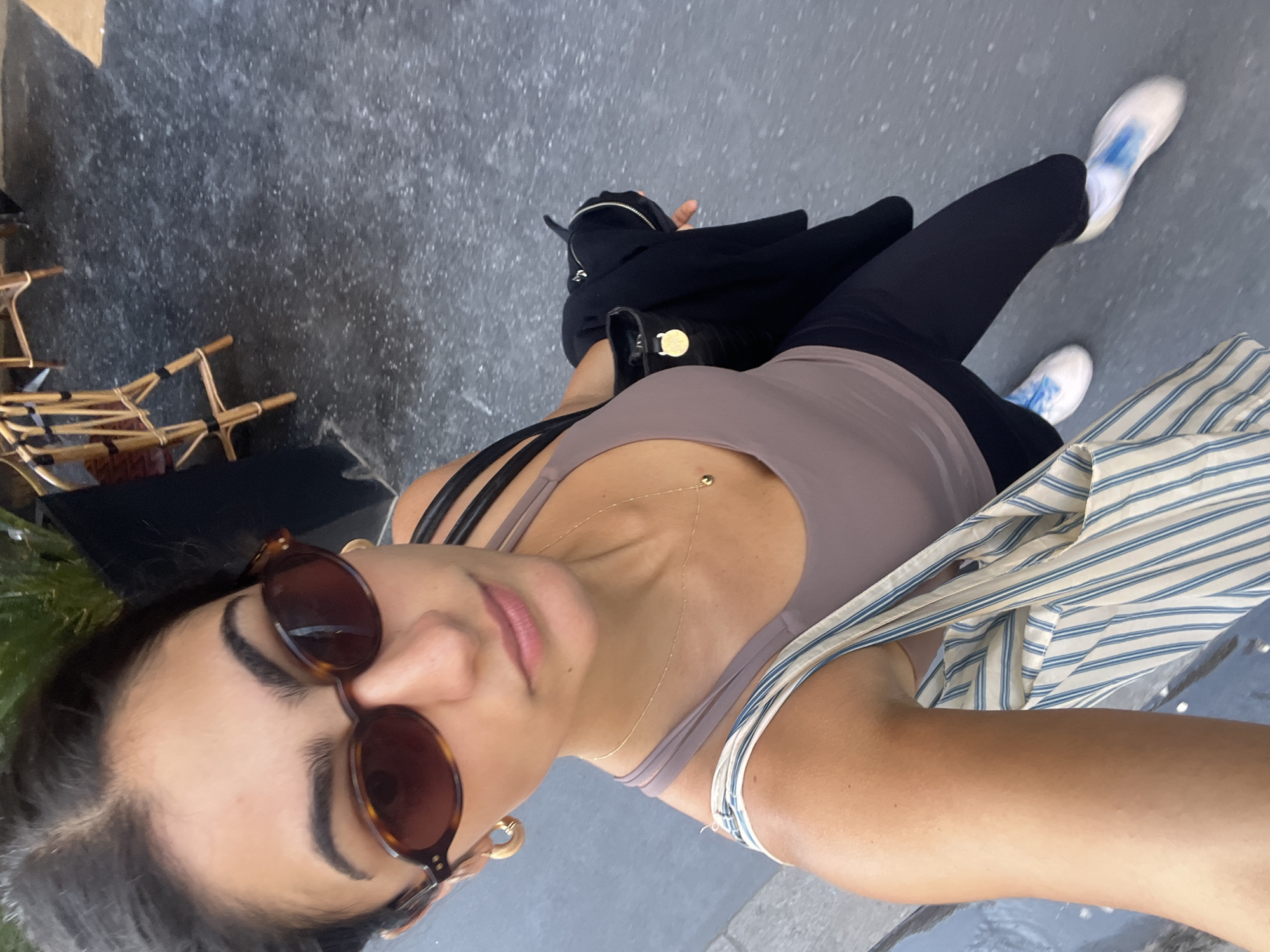 Tourist documents Paris historic building visit with selfies