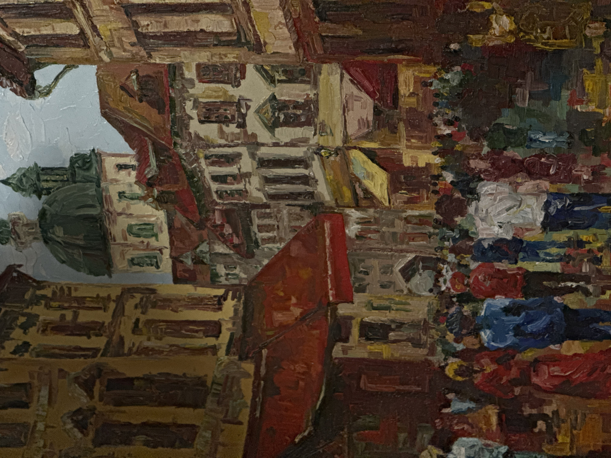 Art collection with cityscape paintings displayed in Puebla