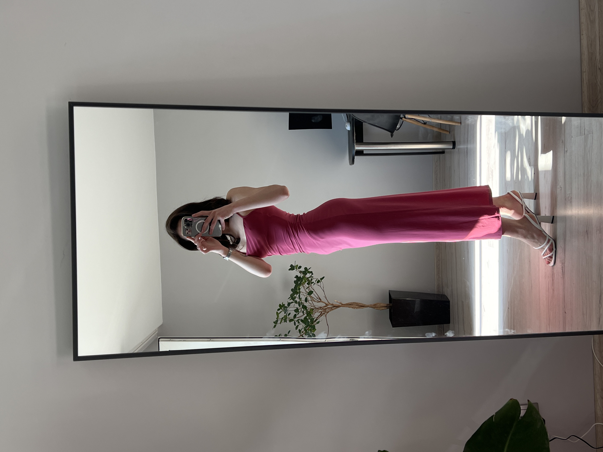 Woman takes morning mirror selfies in Ukrainian apartment