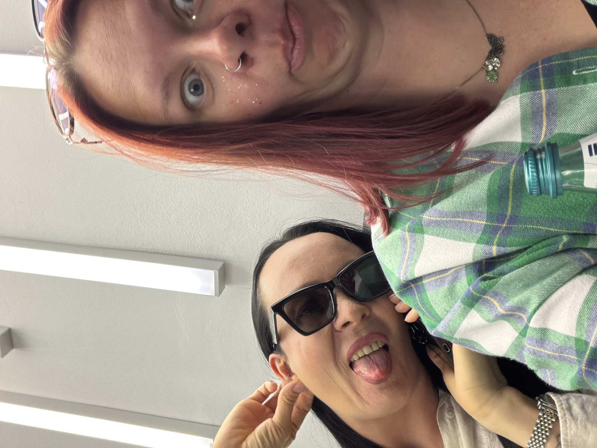 Two people relax on couch in Chaikovsky building