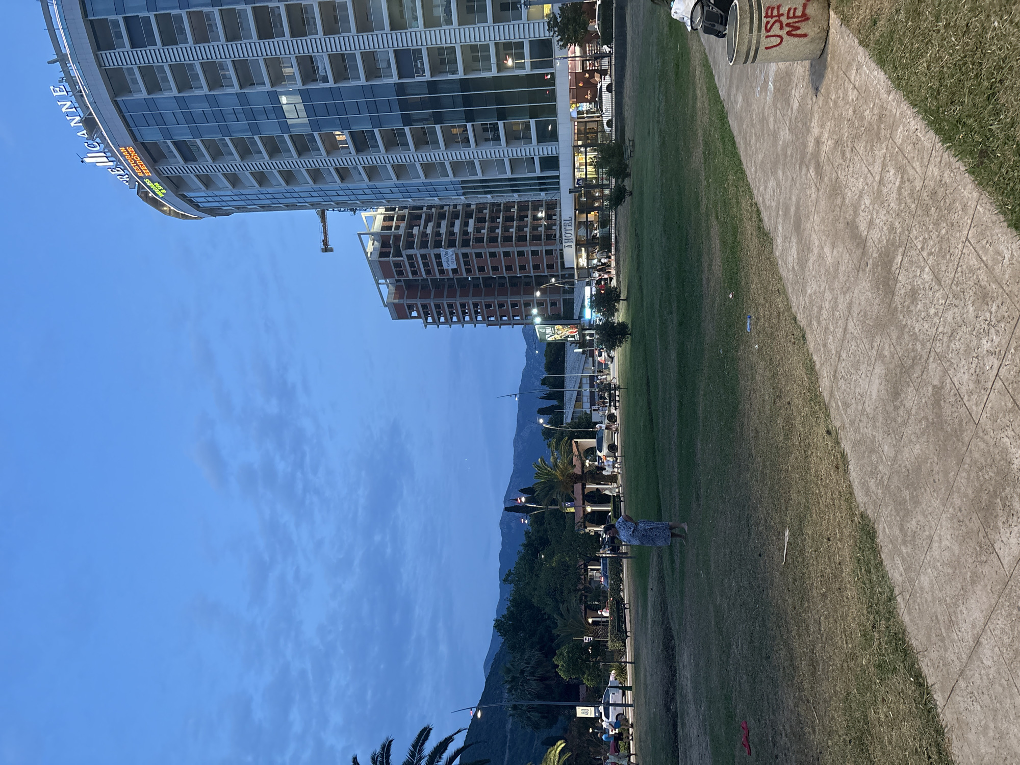 Late afternoon around Budva — streets, buildings, dogs, and a peacock