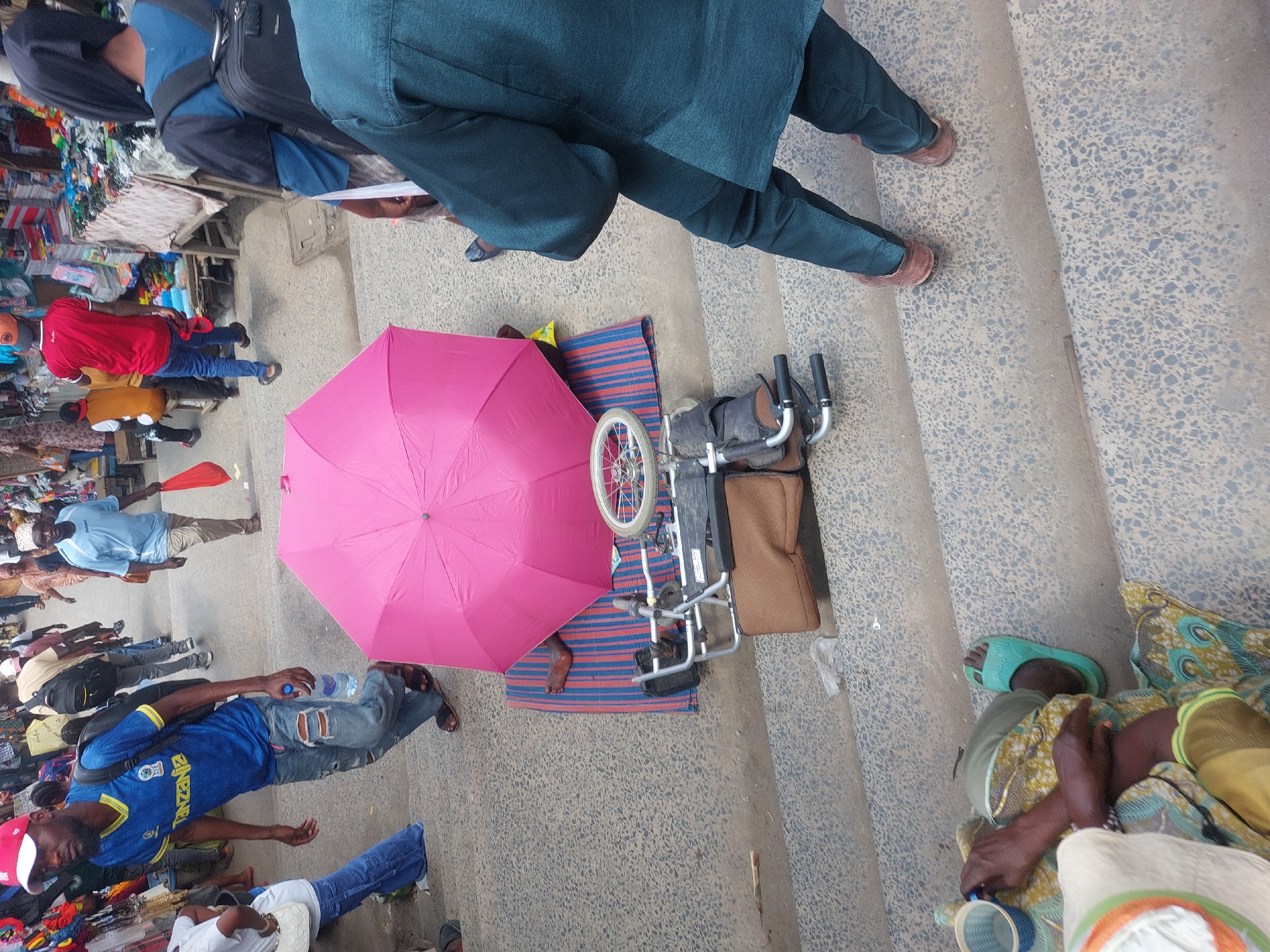 Morning street vendor activity at Dar es-Salaam transport hubs