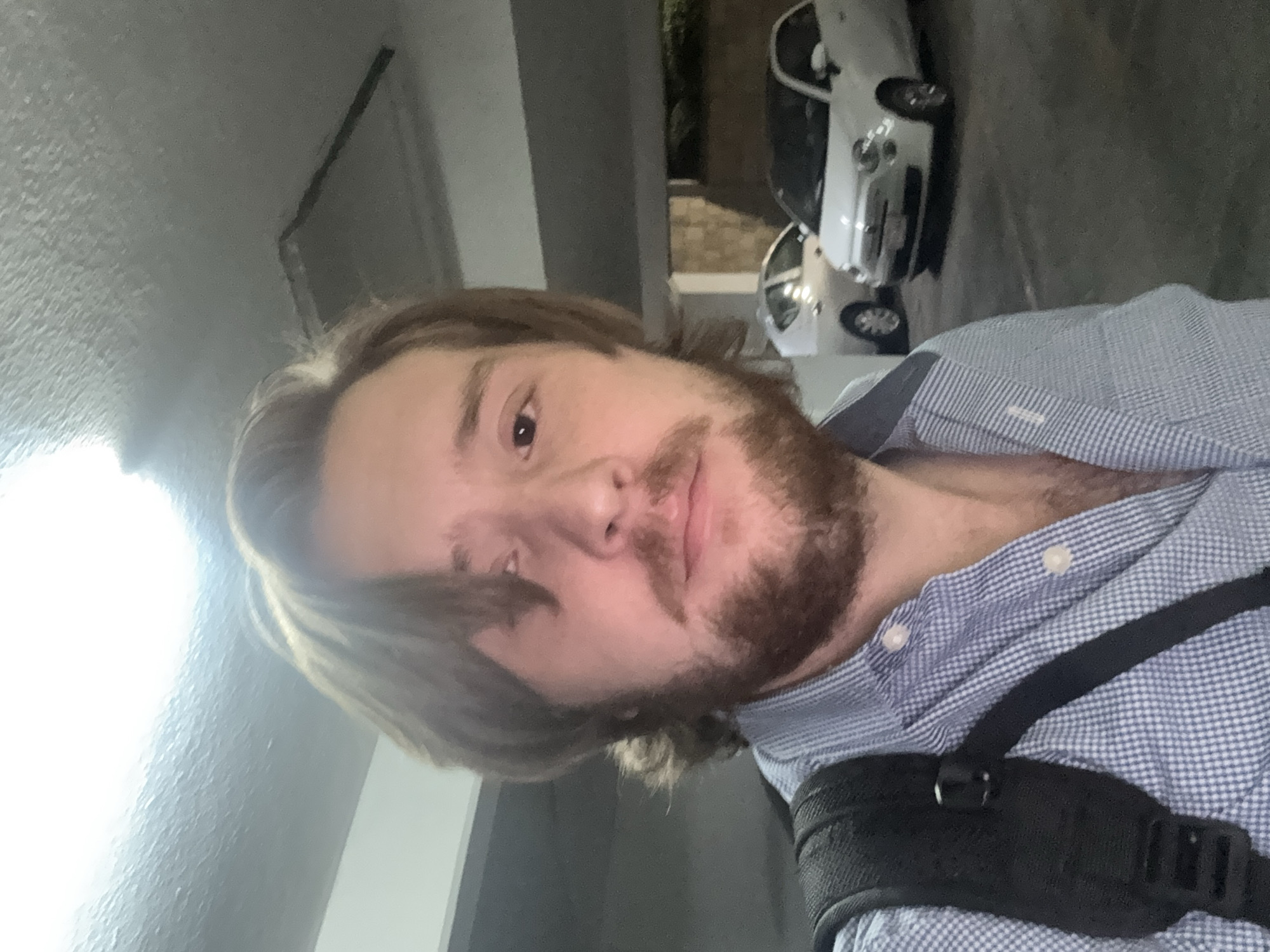 Person takes late-night selfie in Mexico City garage