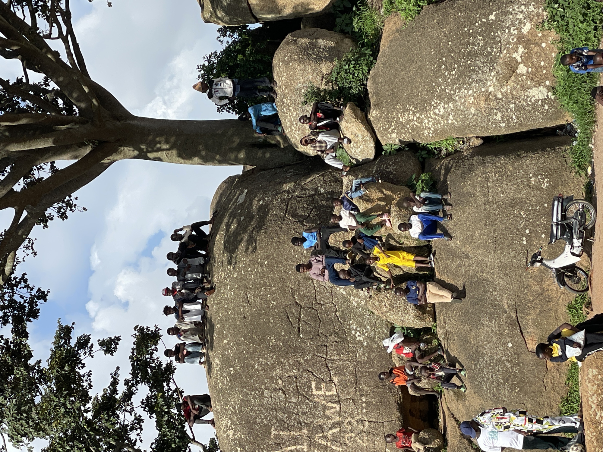 Soccer training session among Jos's rocky granite terrain