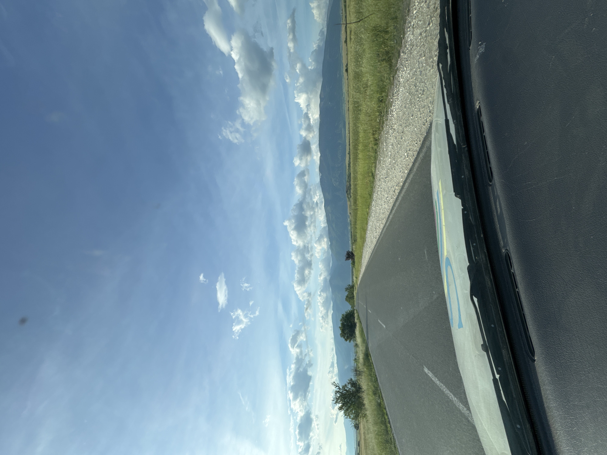 Driver documents scenic mountain road journey in real-time