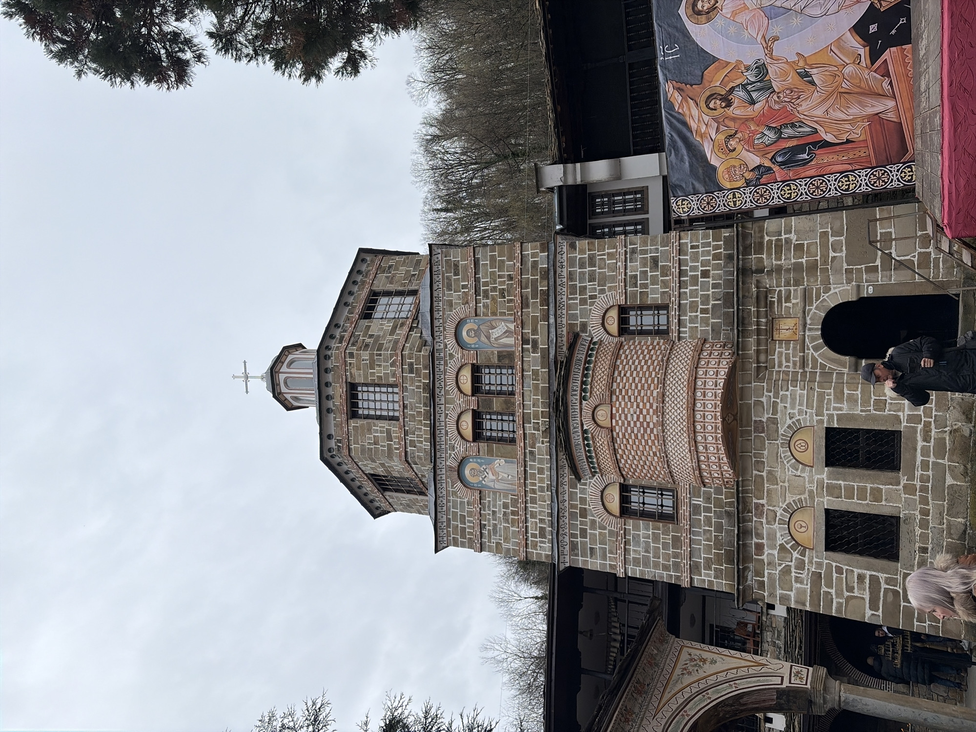 Visitor documents historic Troyan Monastery in Oreshak, Bulgaria