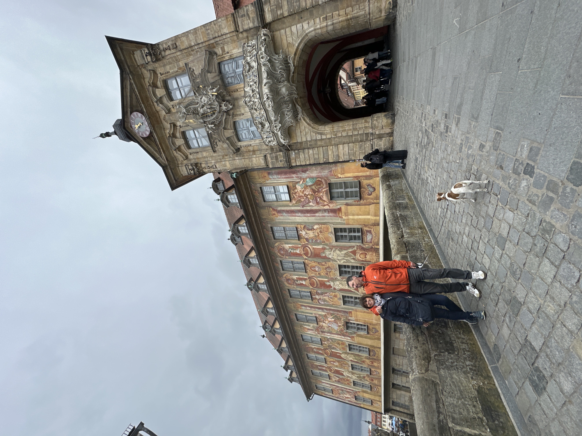 Couple photographed on historic Old Bridge in Bamberg, Germany
