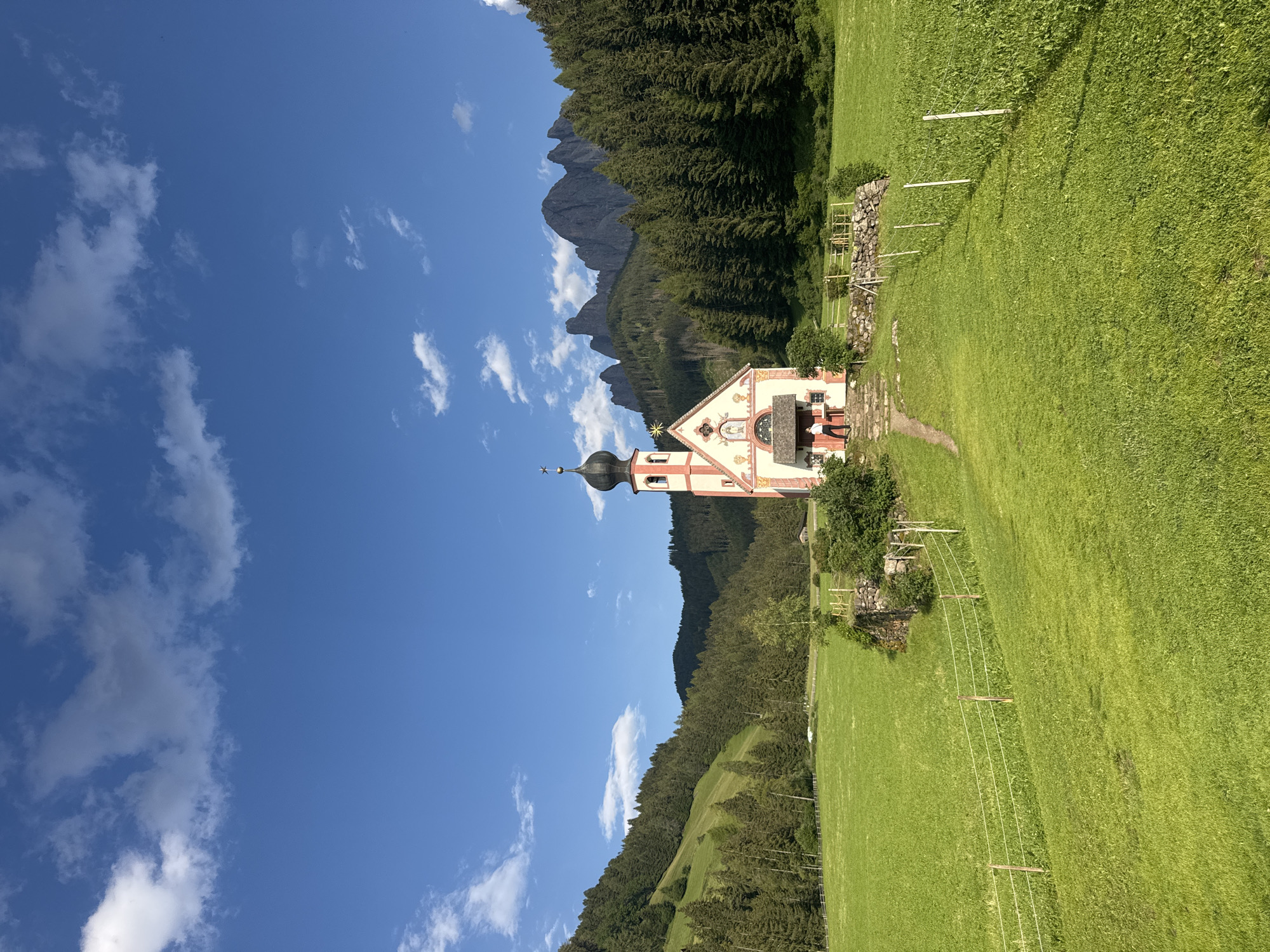 St. Magdalena Church framed against the Dolomites, Val di Funes