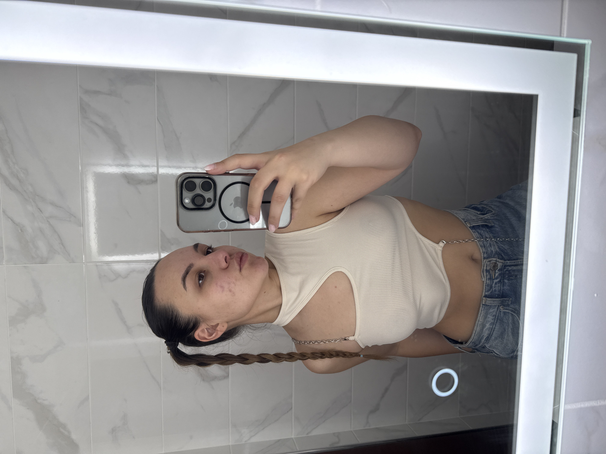 Person Takes Bathroom Mirror Selfie in Sofia