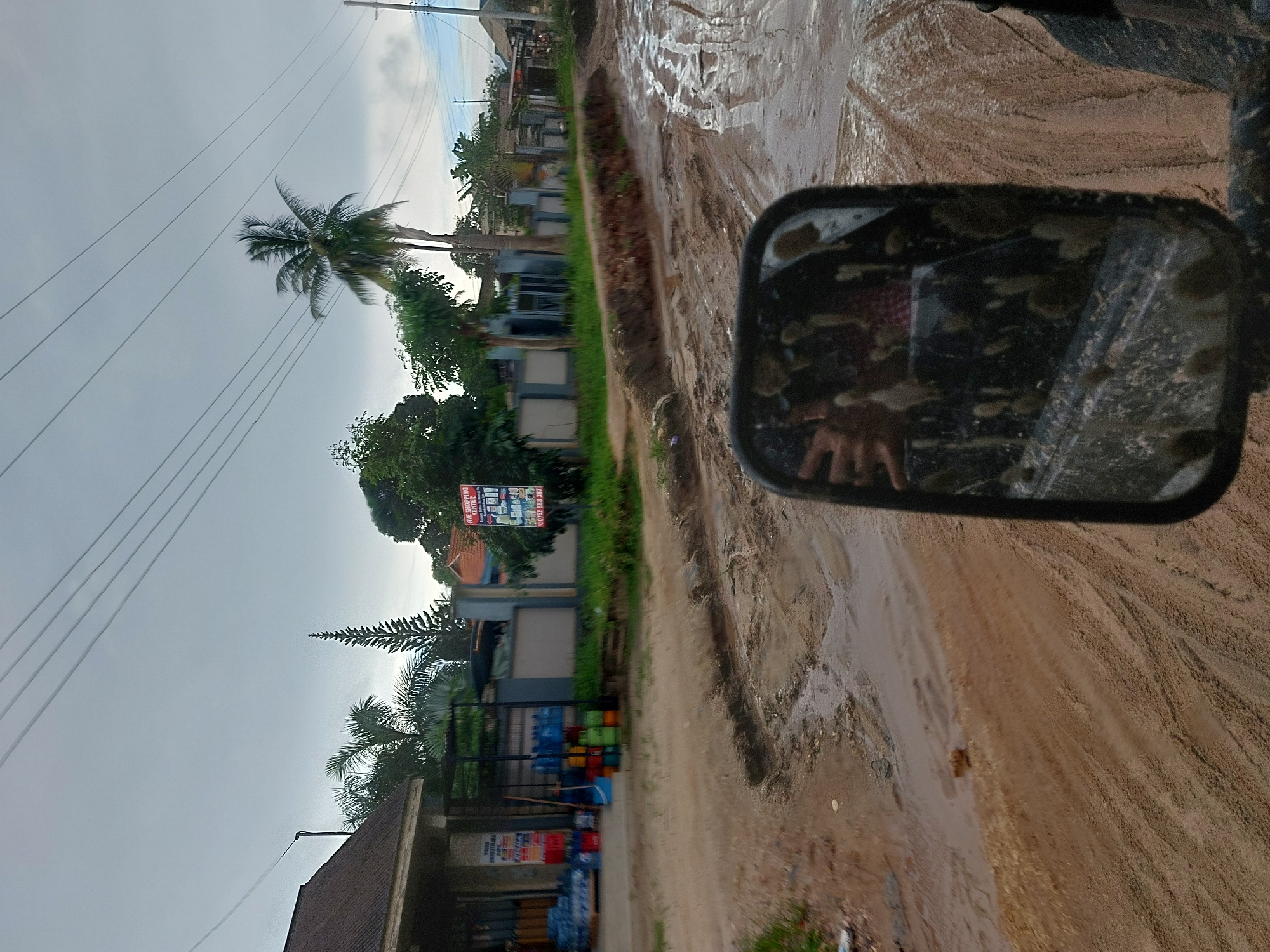 Routine street activity documented at Dar es-Salaam car wash