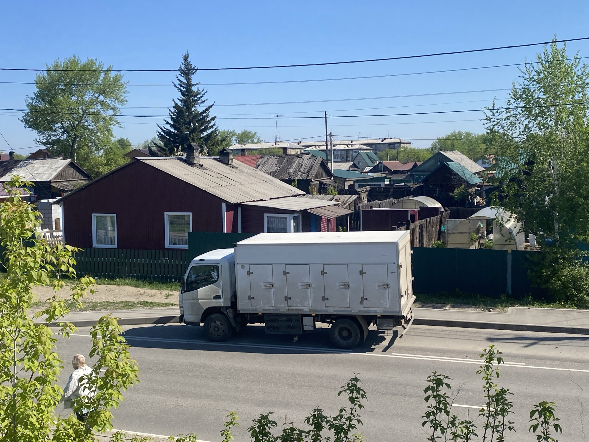 Street traffic and riverside scenes observed in Angarsk, Russia