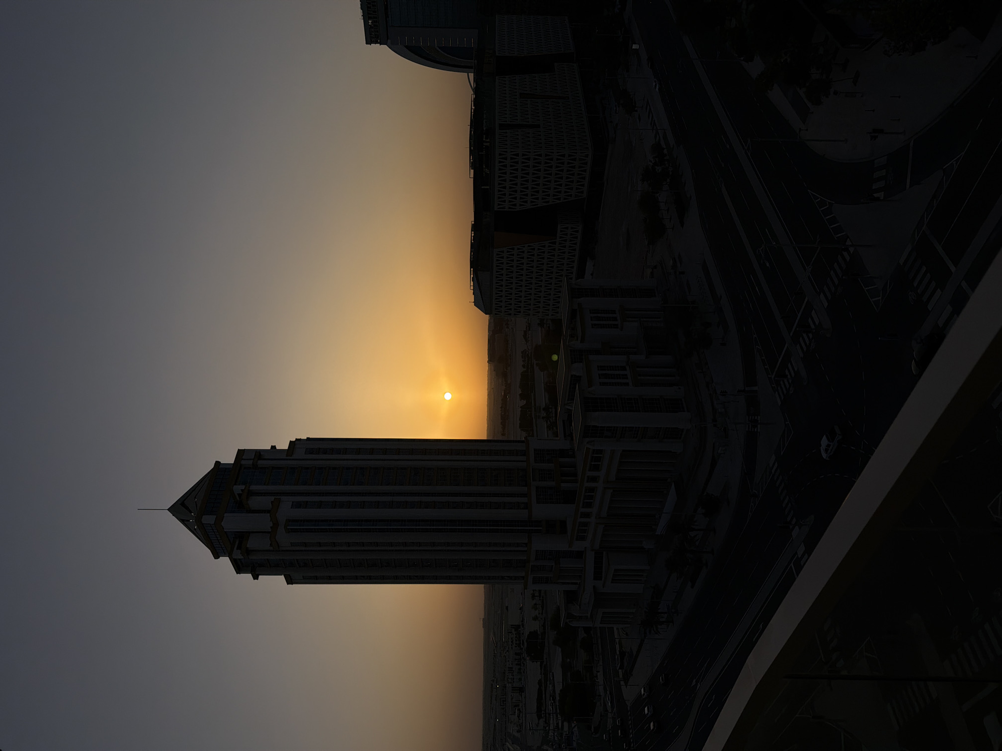 Sunset Over City Skyline Captured by Multiple Witnesses