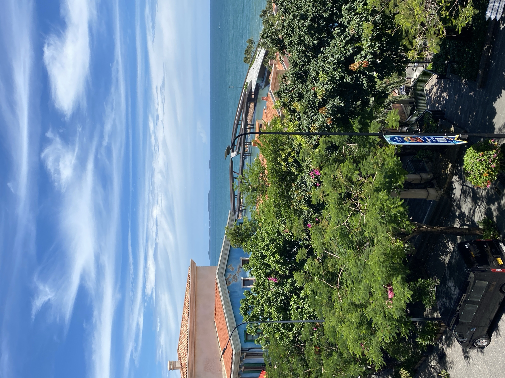 Sun-soaked balcony views over Phú Quốc's coastal resort town