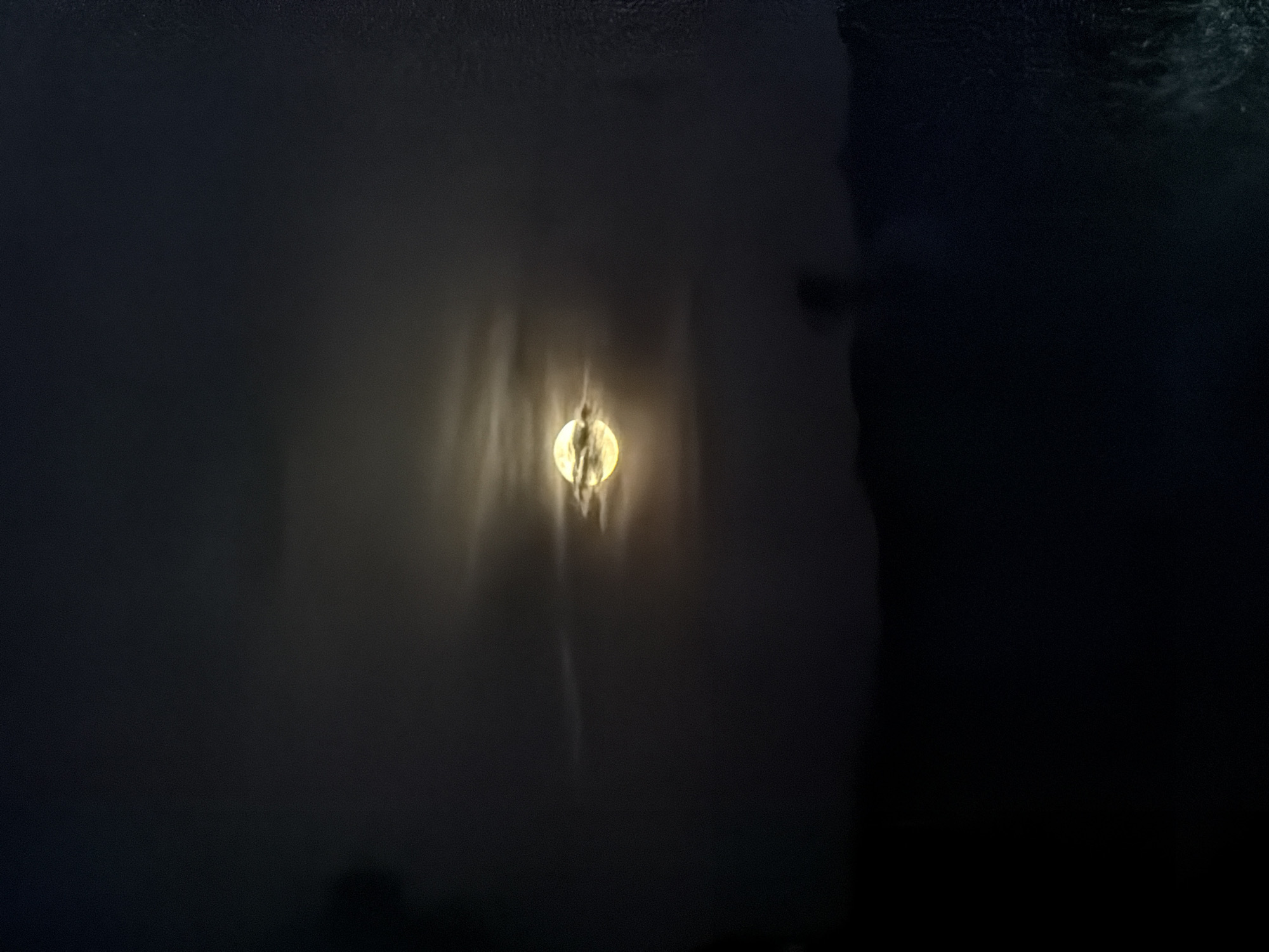 Bright moon photographed through clouds in Cotorra, Colombia