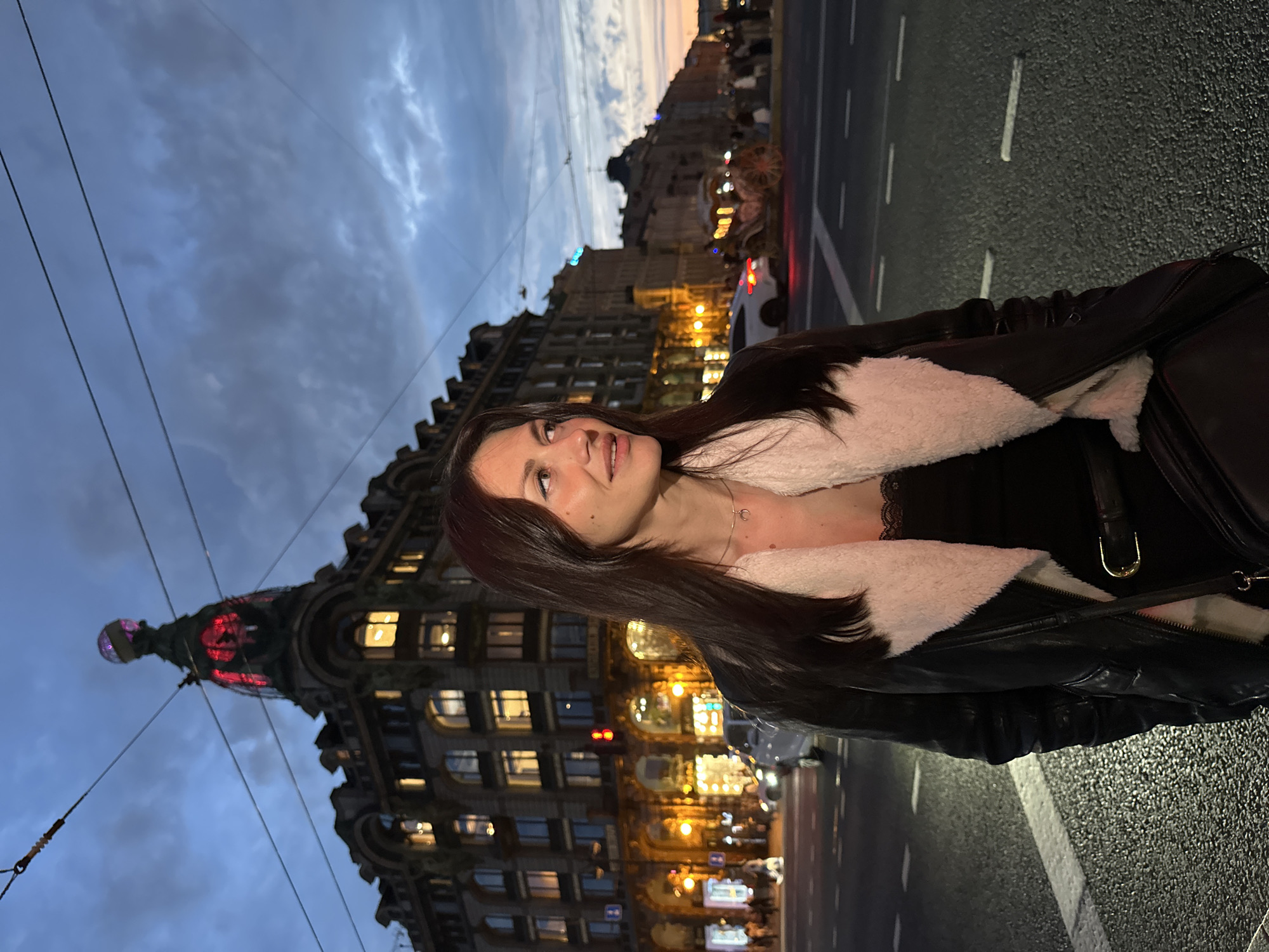 Woman and horse spotted on Saint Petersburg street at dusk