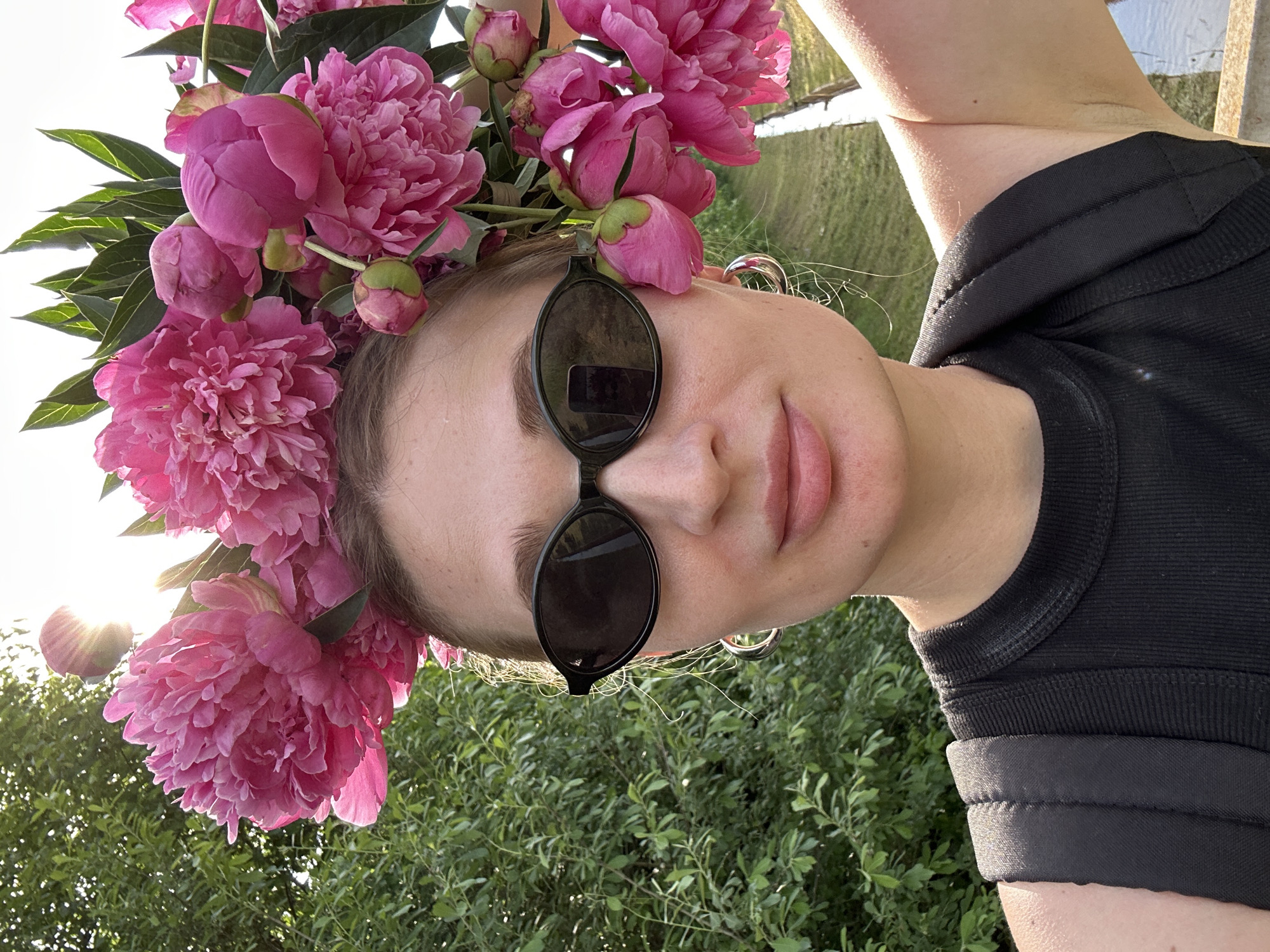 Peony crown selfies by a water channel in Chaikovsky
