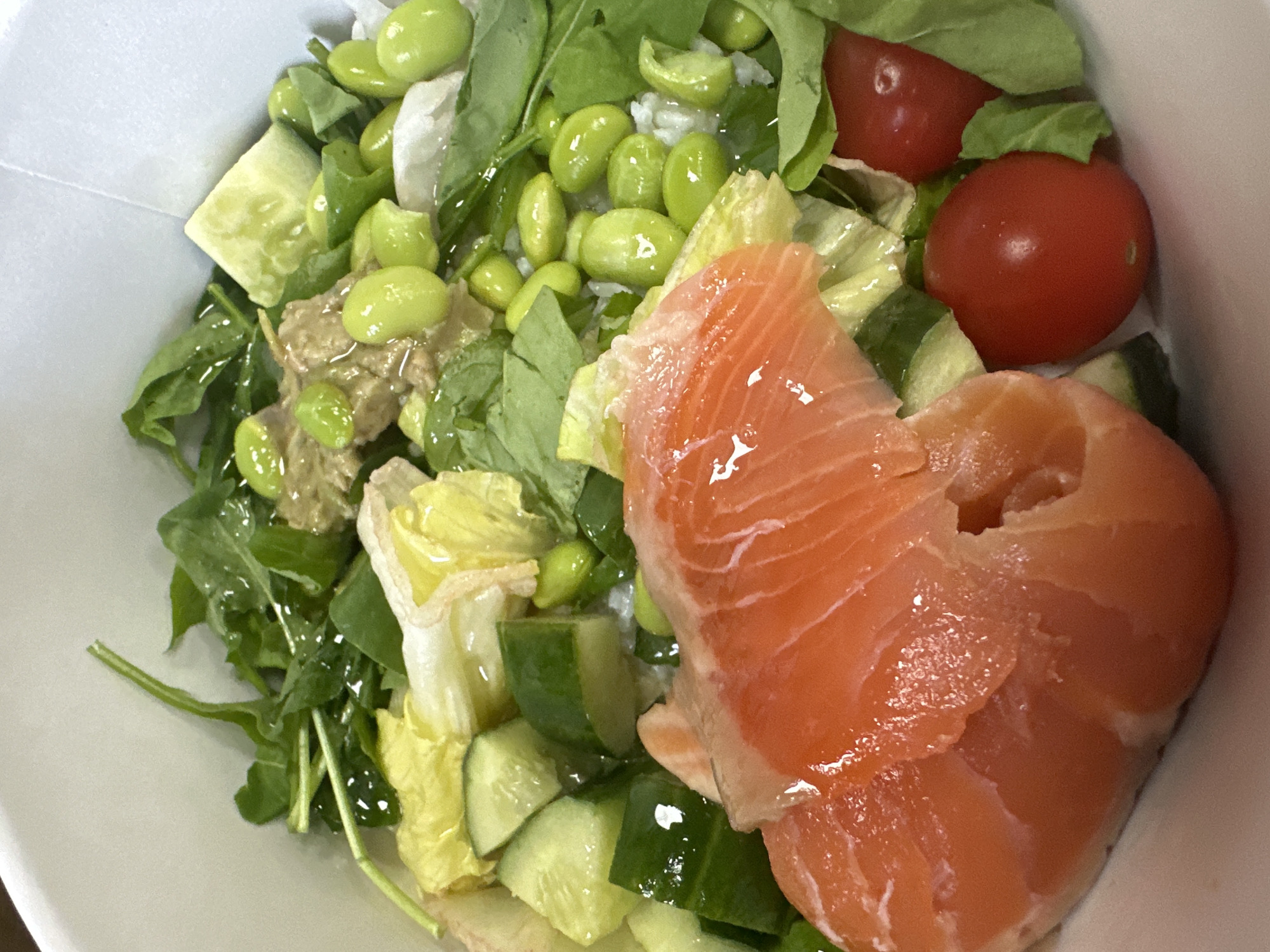 Salmon poke bowl, close up and overhead in Moscow