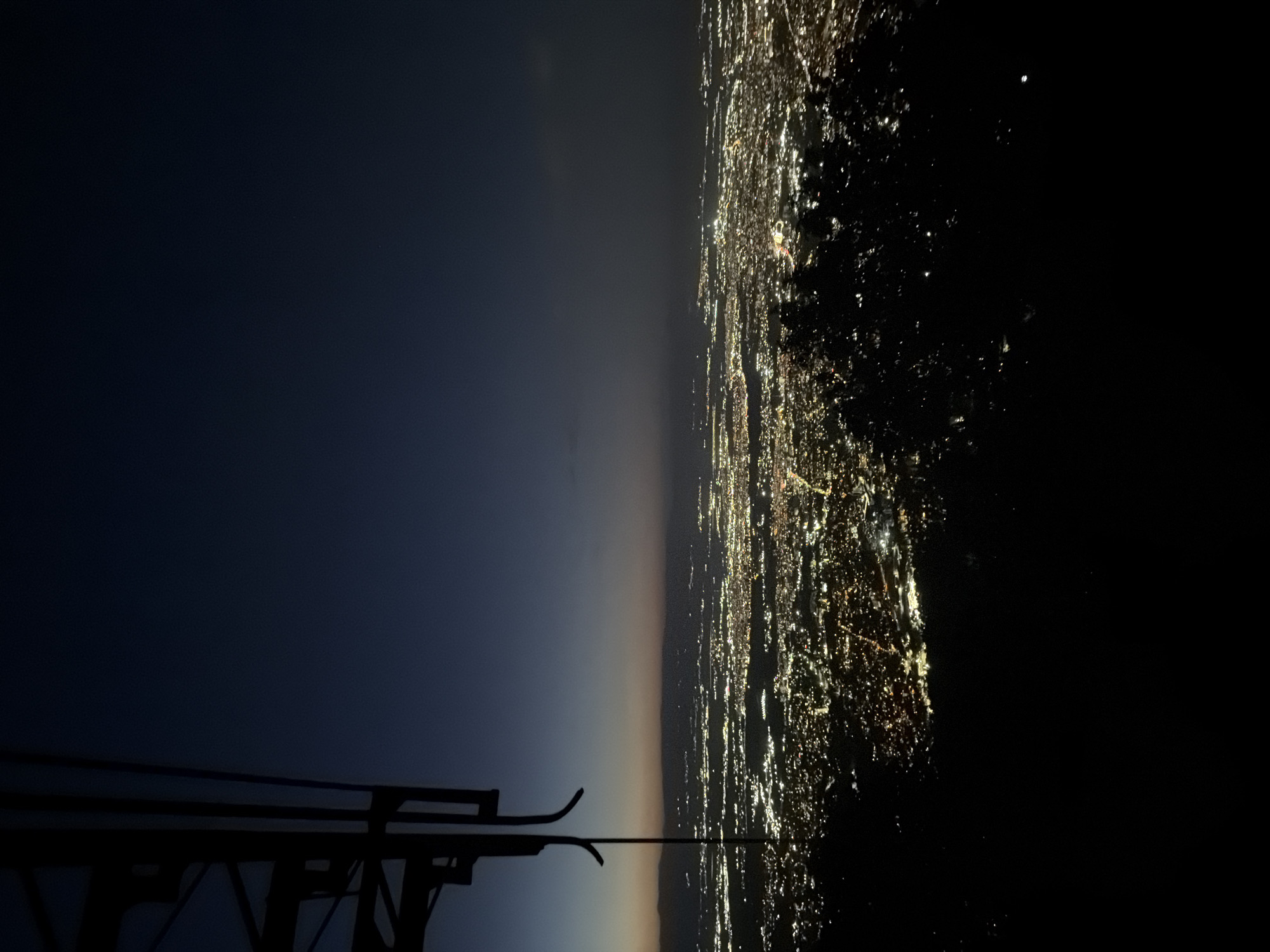 Sofia's nighttime cityscape glows from above