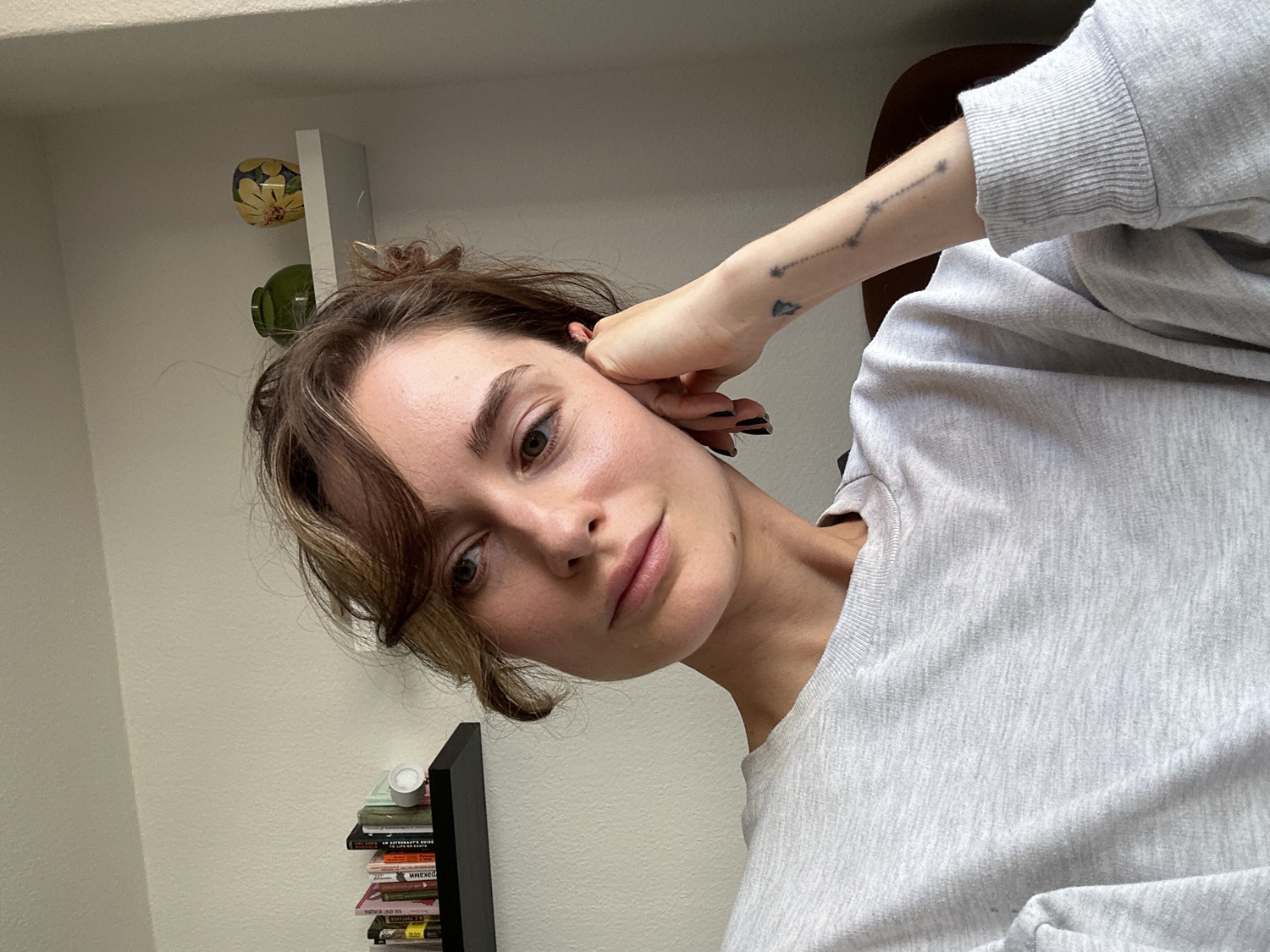 Young person takes casual indoor selfie in Kiel, Germany