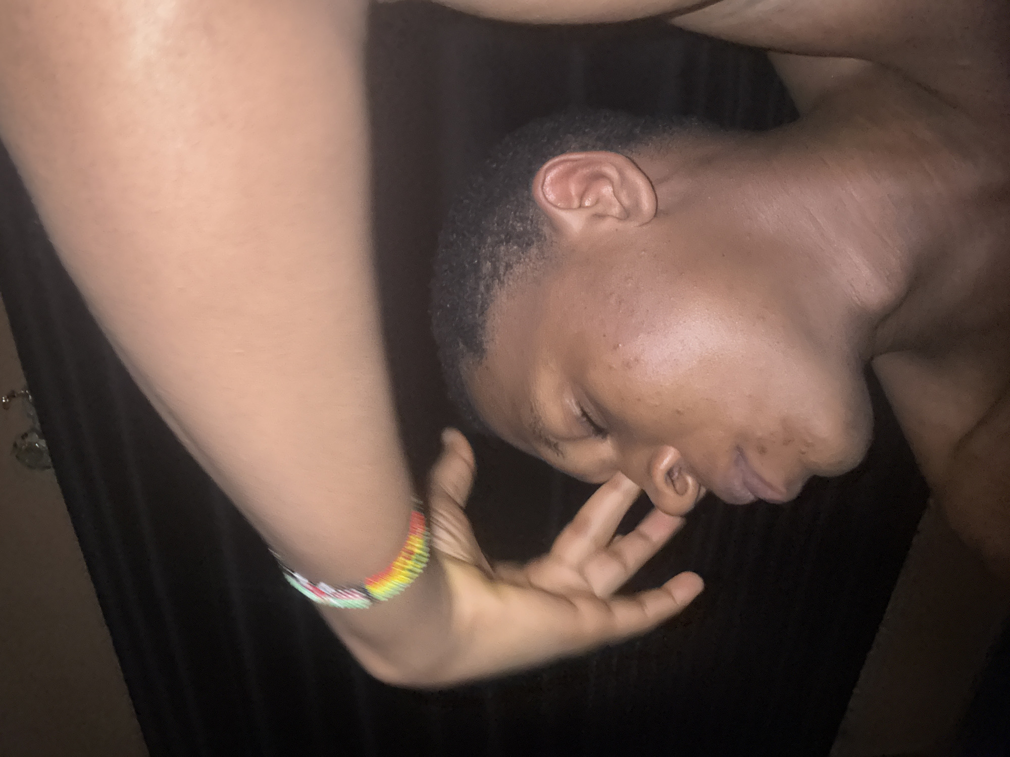 Late-night chill session in an Obosi bedroom, selfies and all