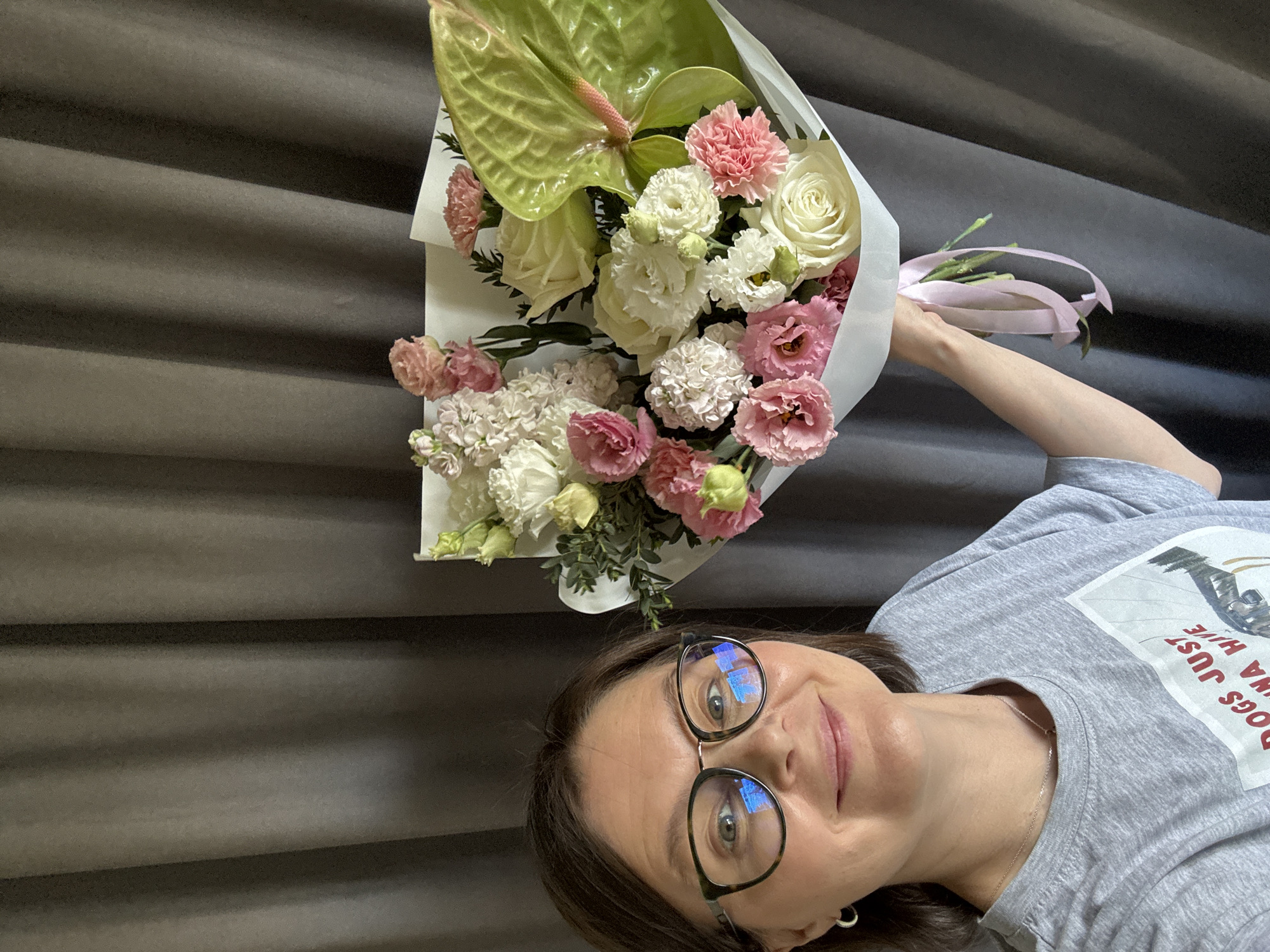 Woman receives flower bouquet, shares domestic moments in Izhevsk
