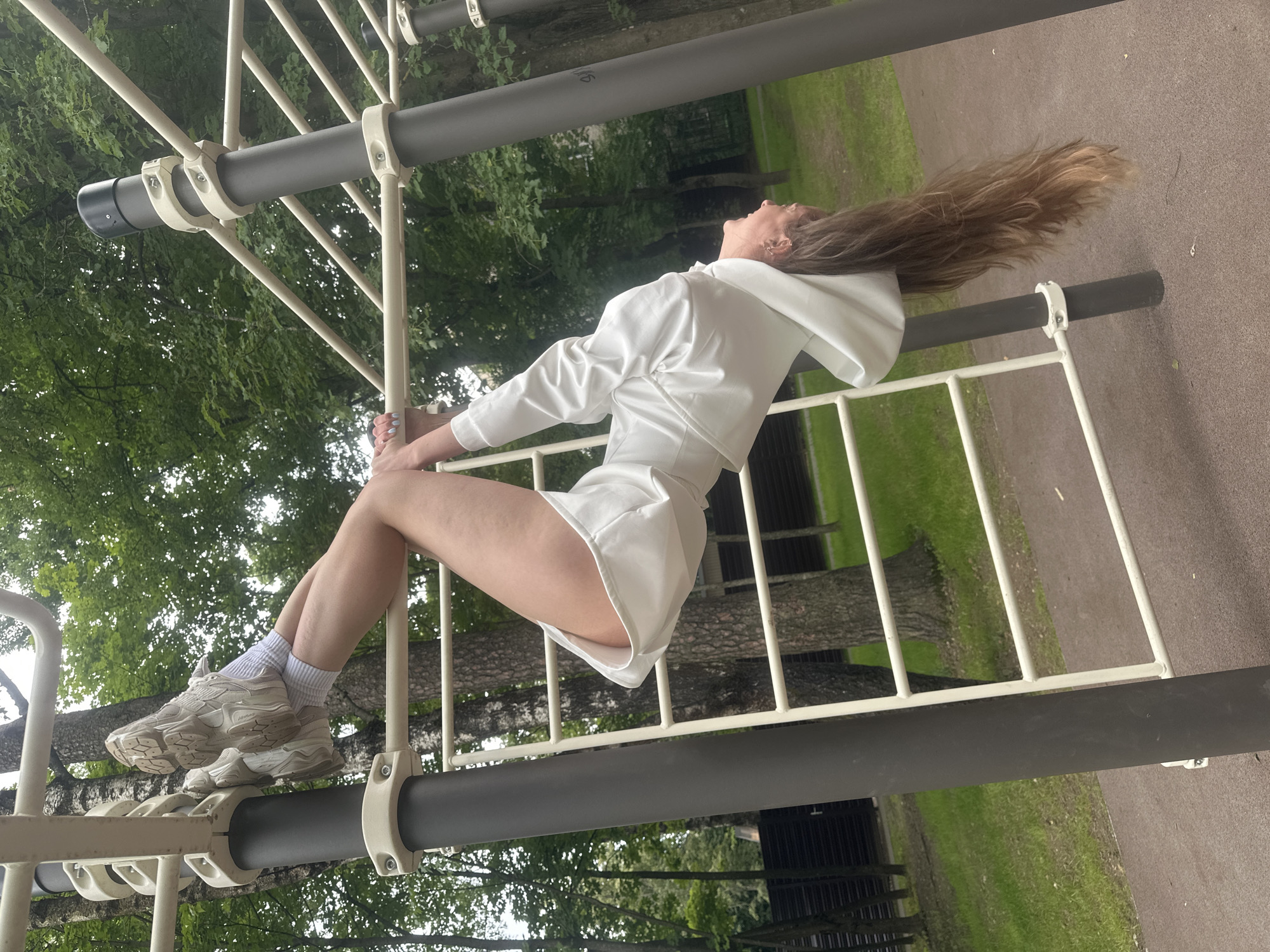 Gymnastic session on outdoor bars in Khimki park