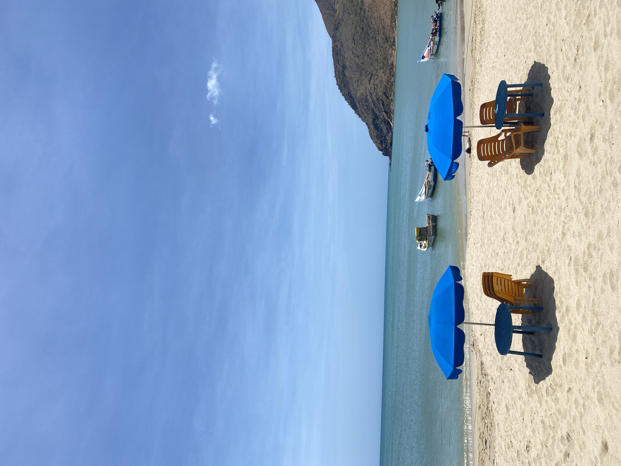 Beach furniture spotted along Juan Griego coastline