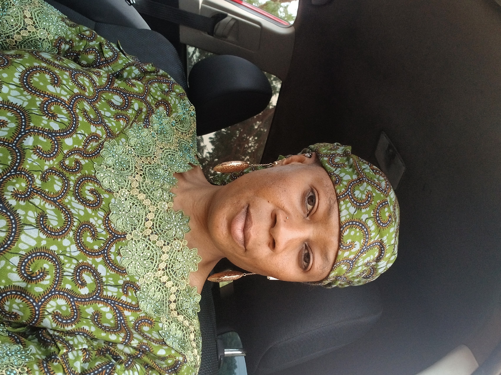 Woman in traditional dress observed in car, Rigachikun Nigeria