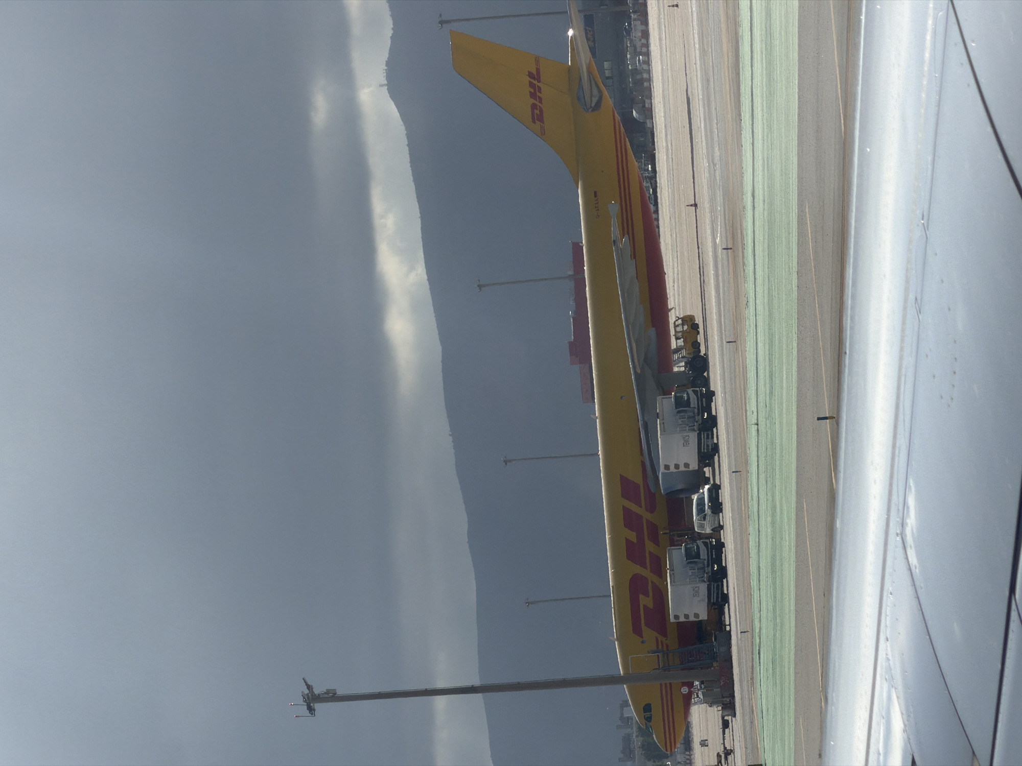 Passenger documents routine airport operations at Barcelona-El Prat Airport
