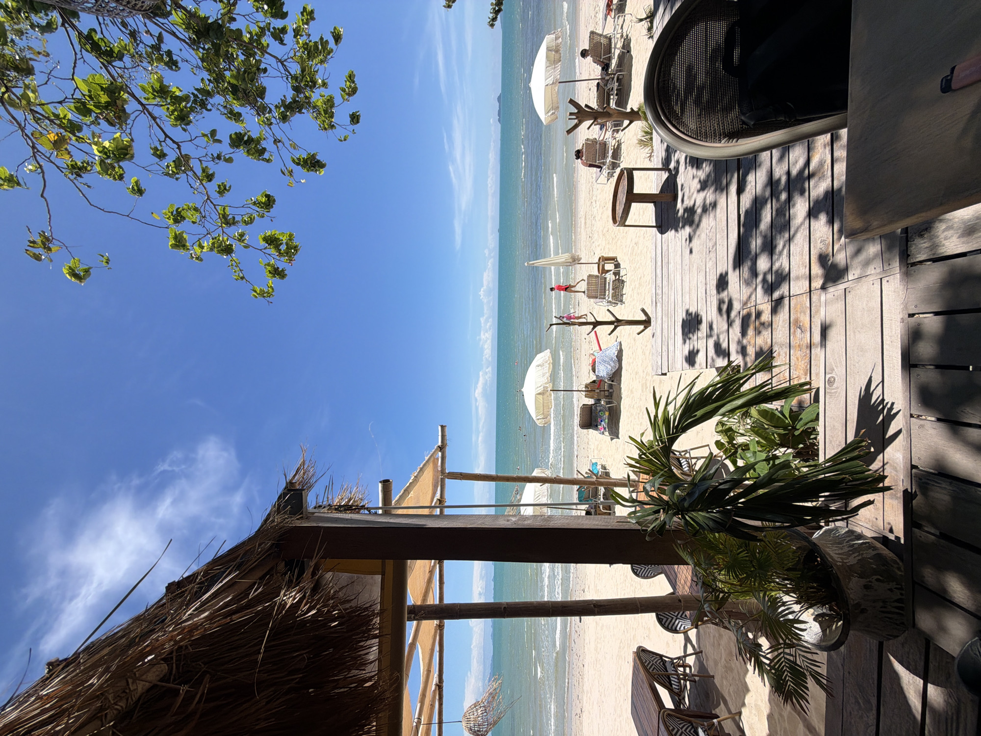 A relaxed morning scene along Baan Tai's beach and shoreline