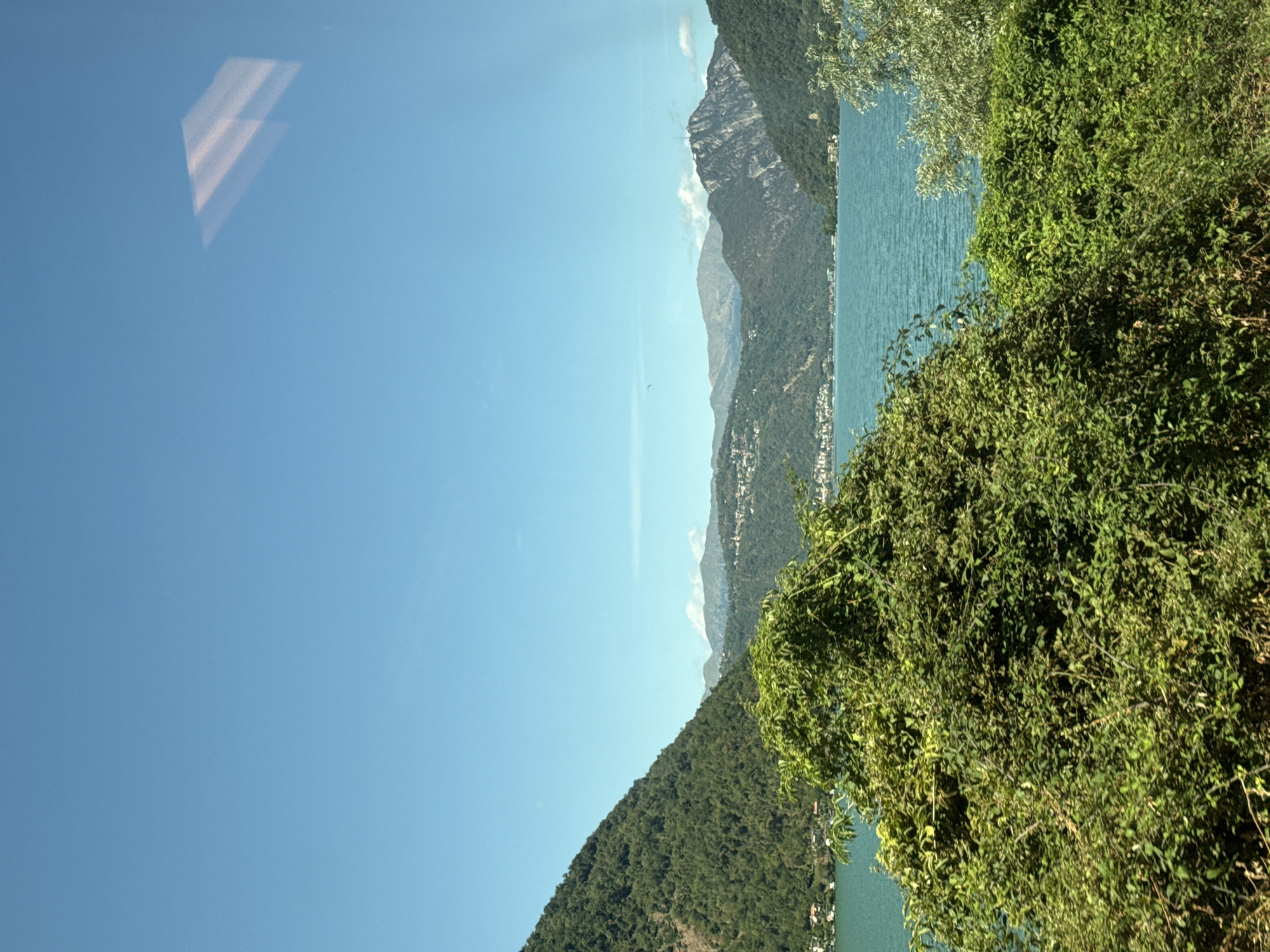 Lake Lugano's turquoise waters from the Mendrisio hills