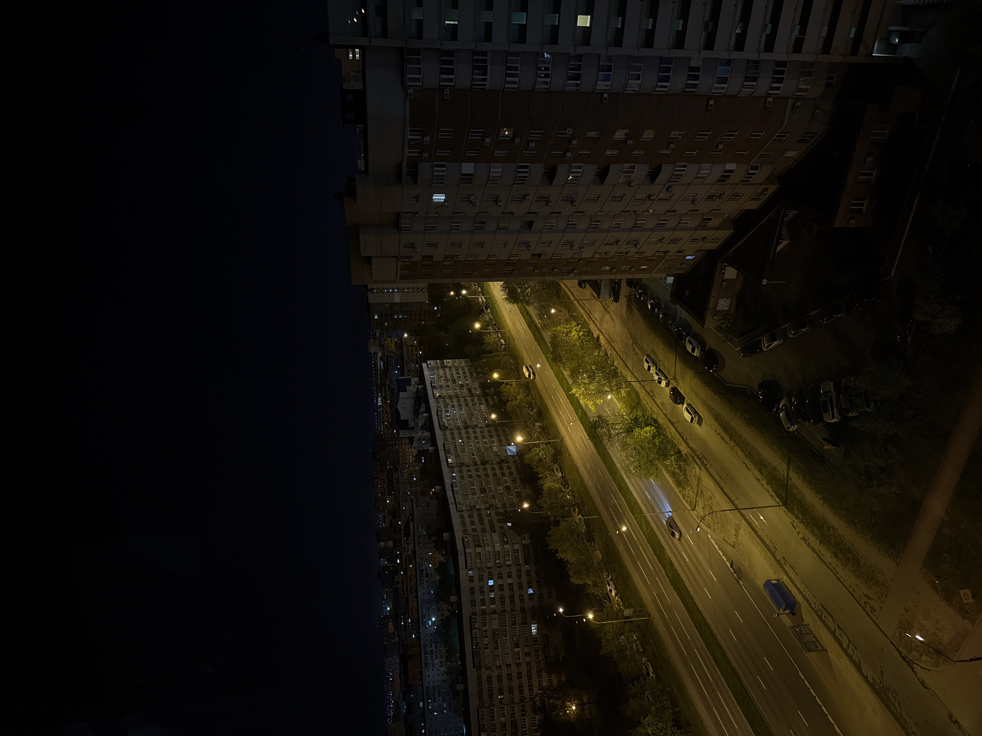 Night view captures illuminated apartment blocks in Tolyatti, Russia