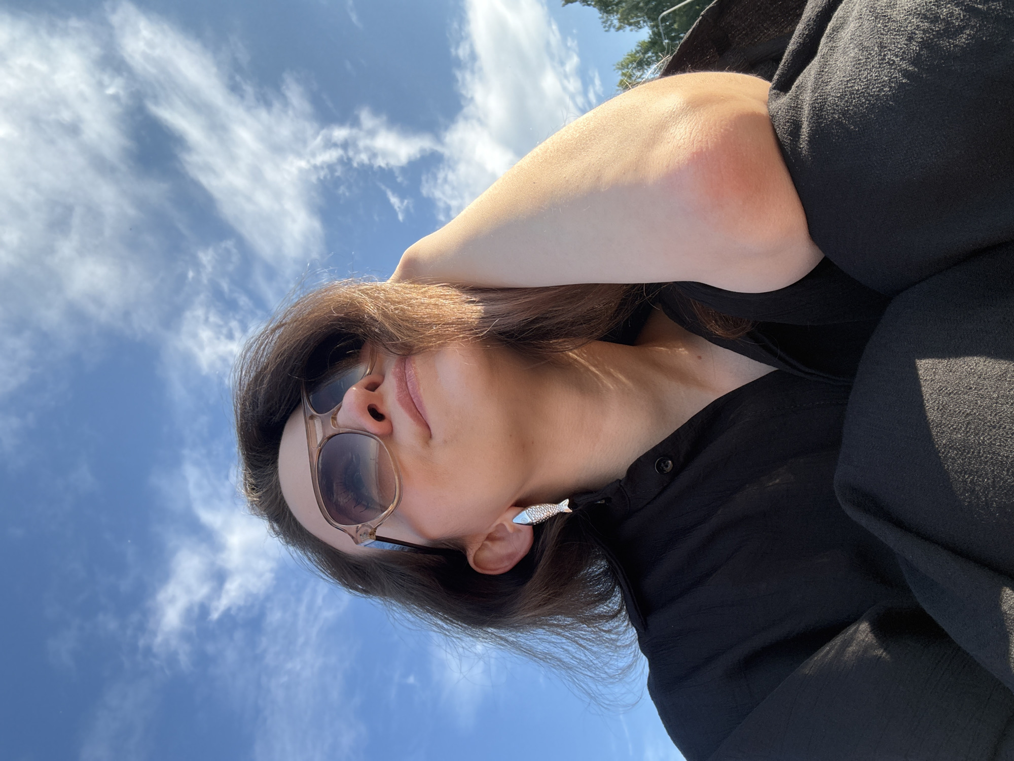 Woman documents beach visit with selfies in Chaikovsky, Russia