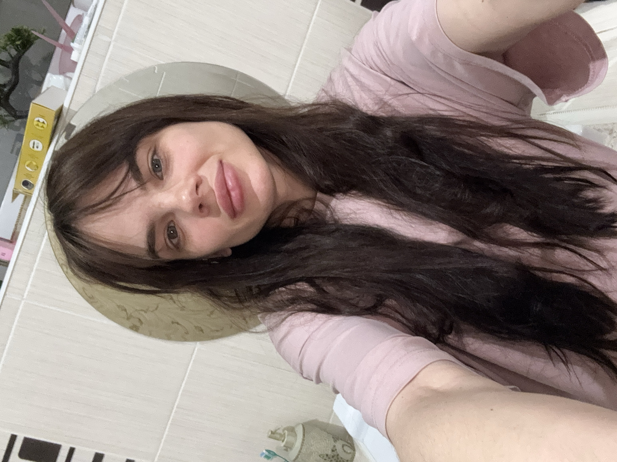 Woman Takes Multiple Mirror Selfies in Rostov-on-Don Apartment